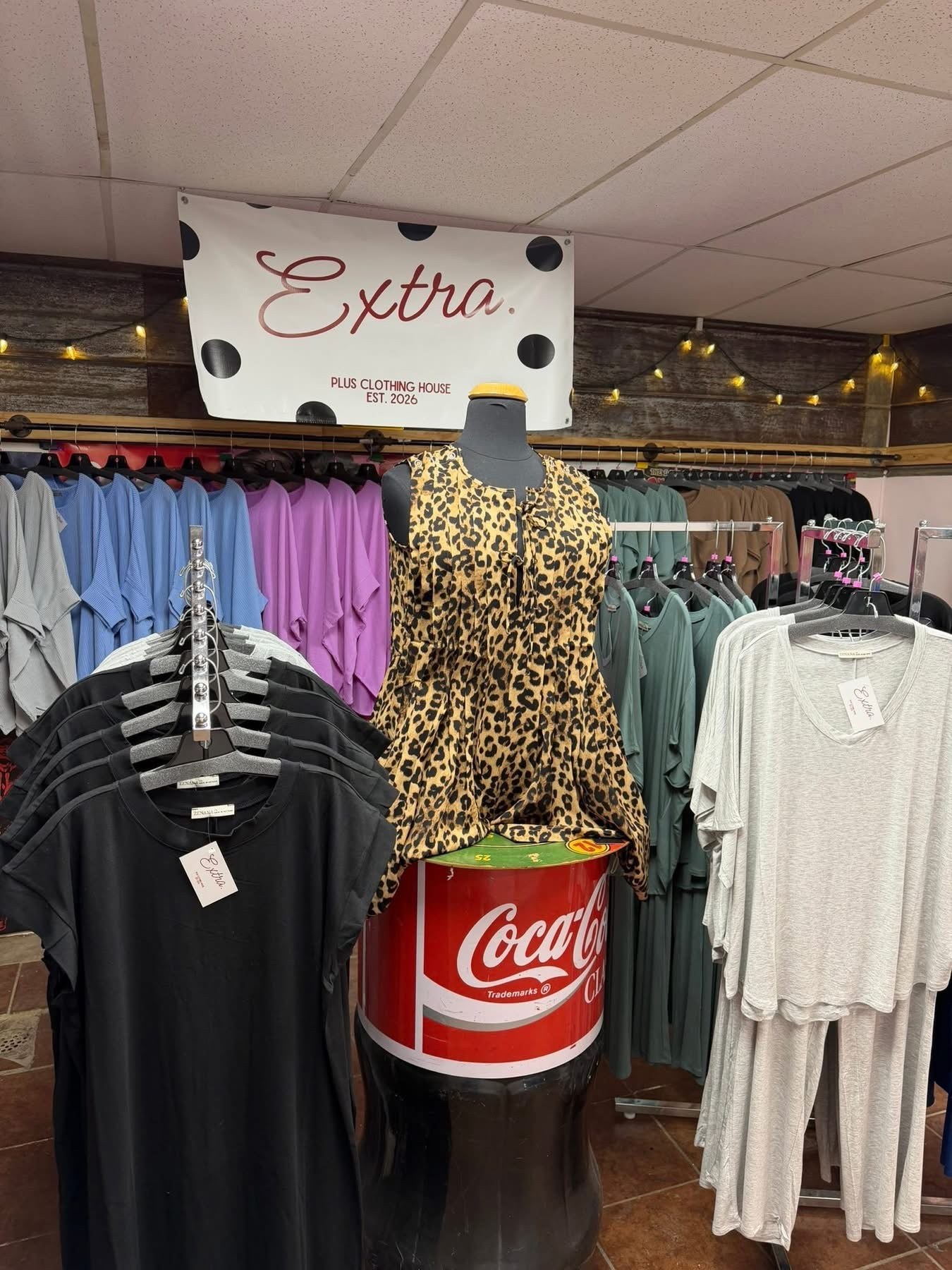 Inside Extra Plus Clothing House with plus-size clothing on display