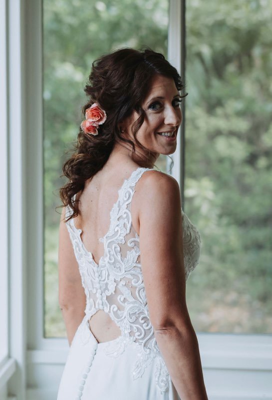 Bride with a soft polished wedding hairstyle
