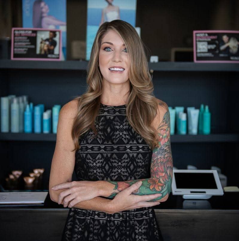 Michelle Dinsbeer with a bridal client