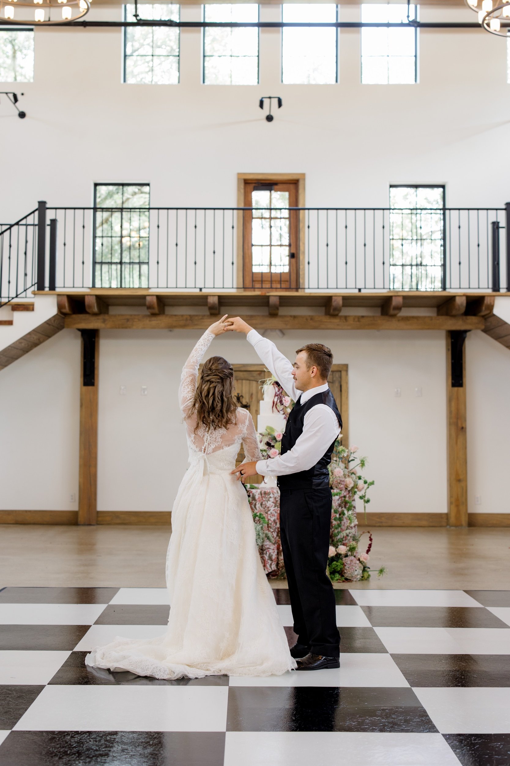 Bride and groom dancing together on their wedding day