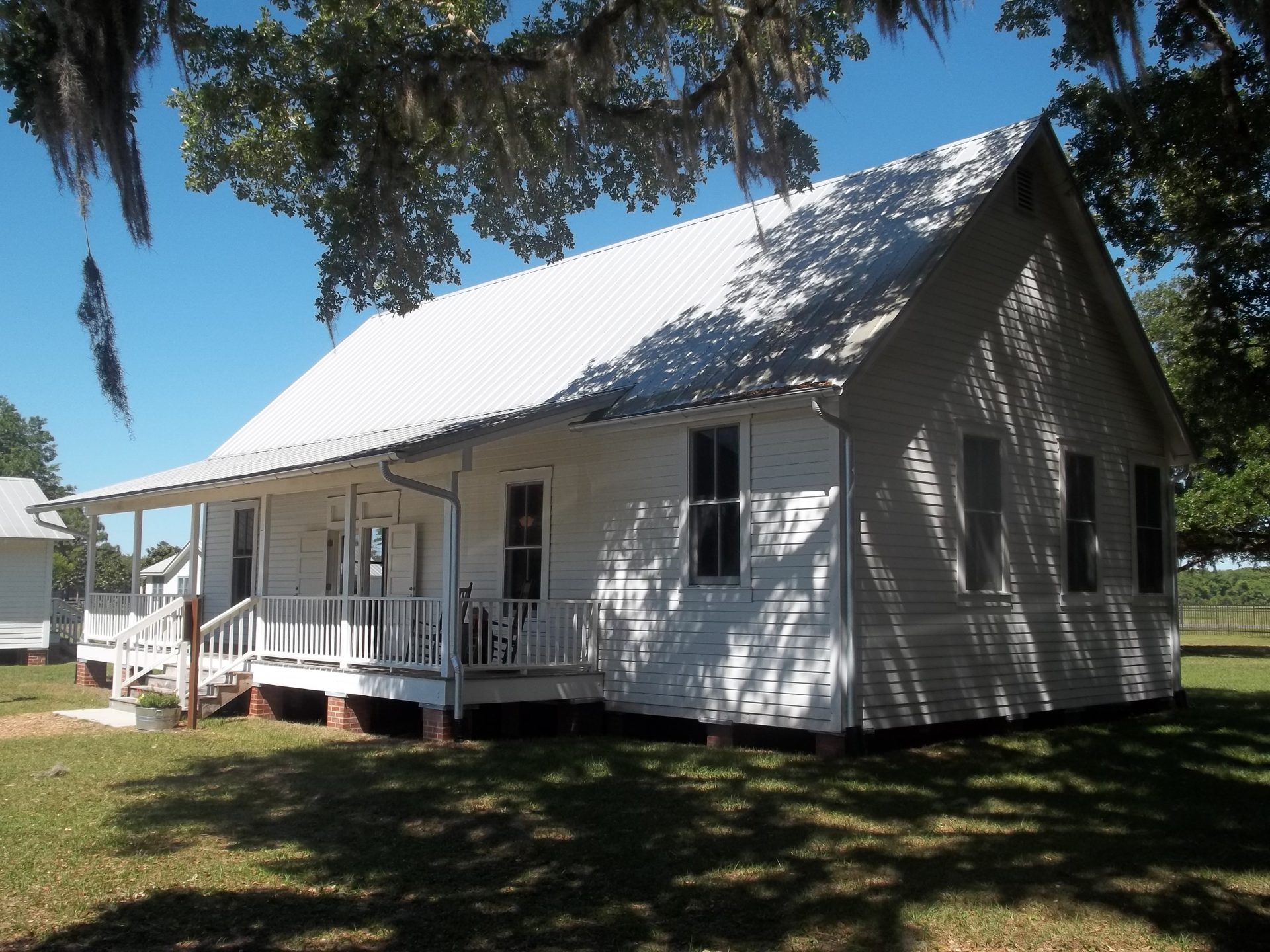 White wooden Union School building at Fort Christmas Historical Park