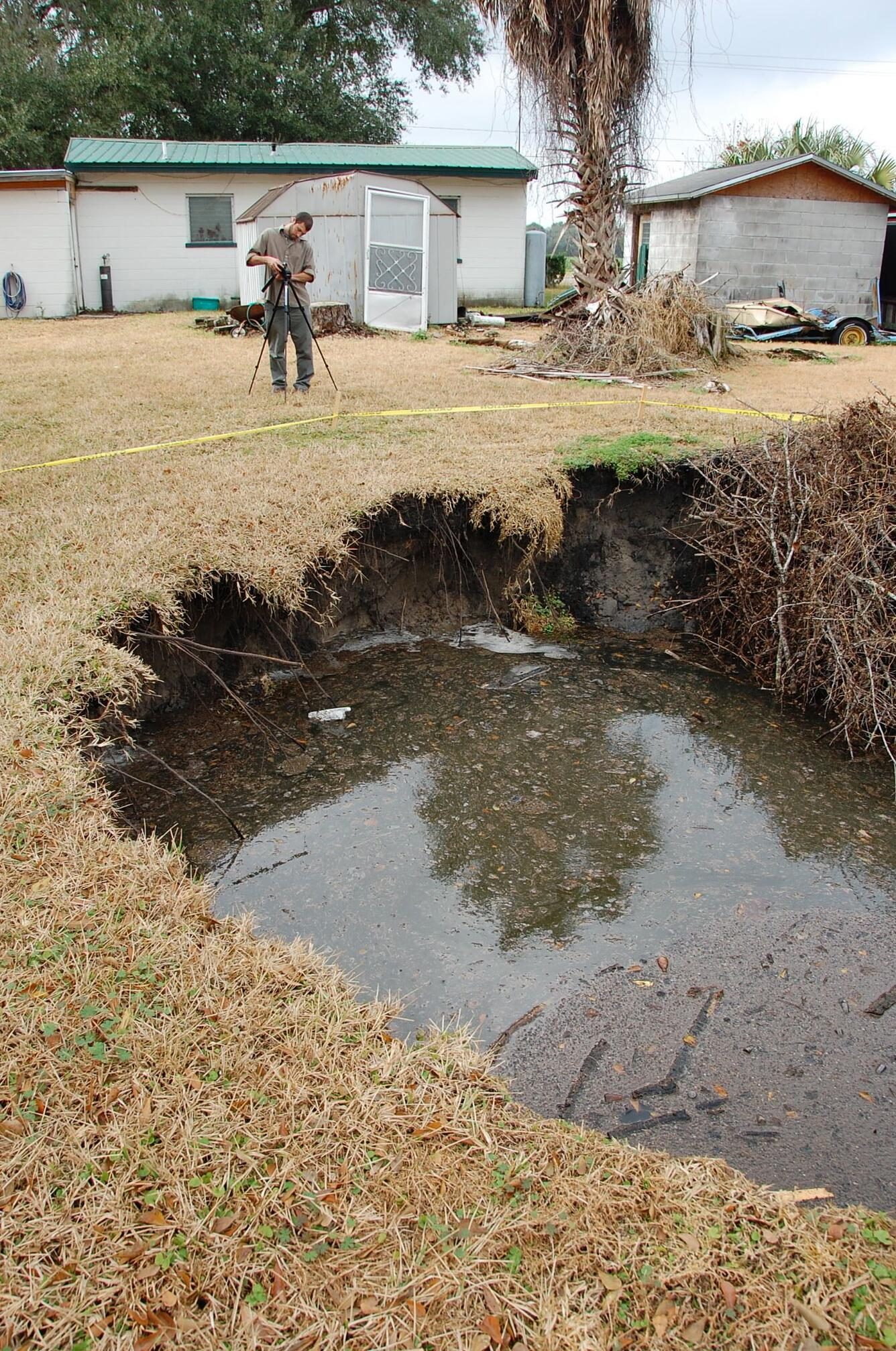 Documented sinkhole beside buildings in west-central Florida after the January 2010 freeze