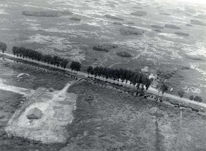 Historical aerial photograph of the Tamiami Trail and adjacent canal through the Everglades