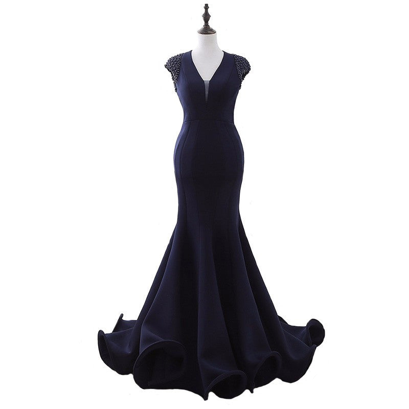 Midnight navy Darius Cordell gown with a sculpted flared skirt