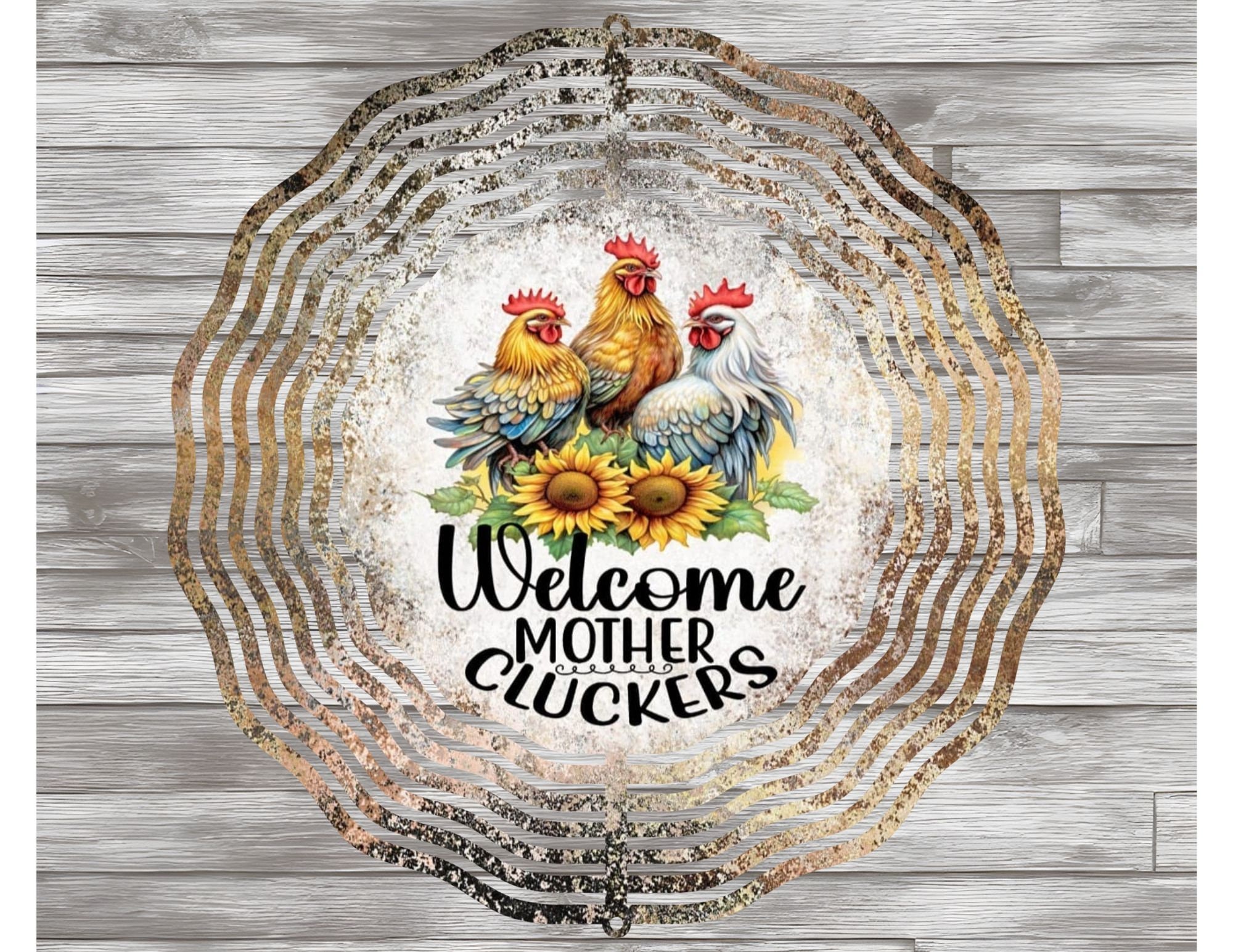Whimsical rooster wind spinner hanging outdoors
