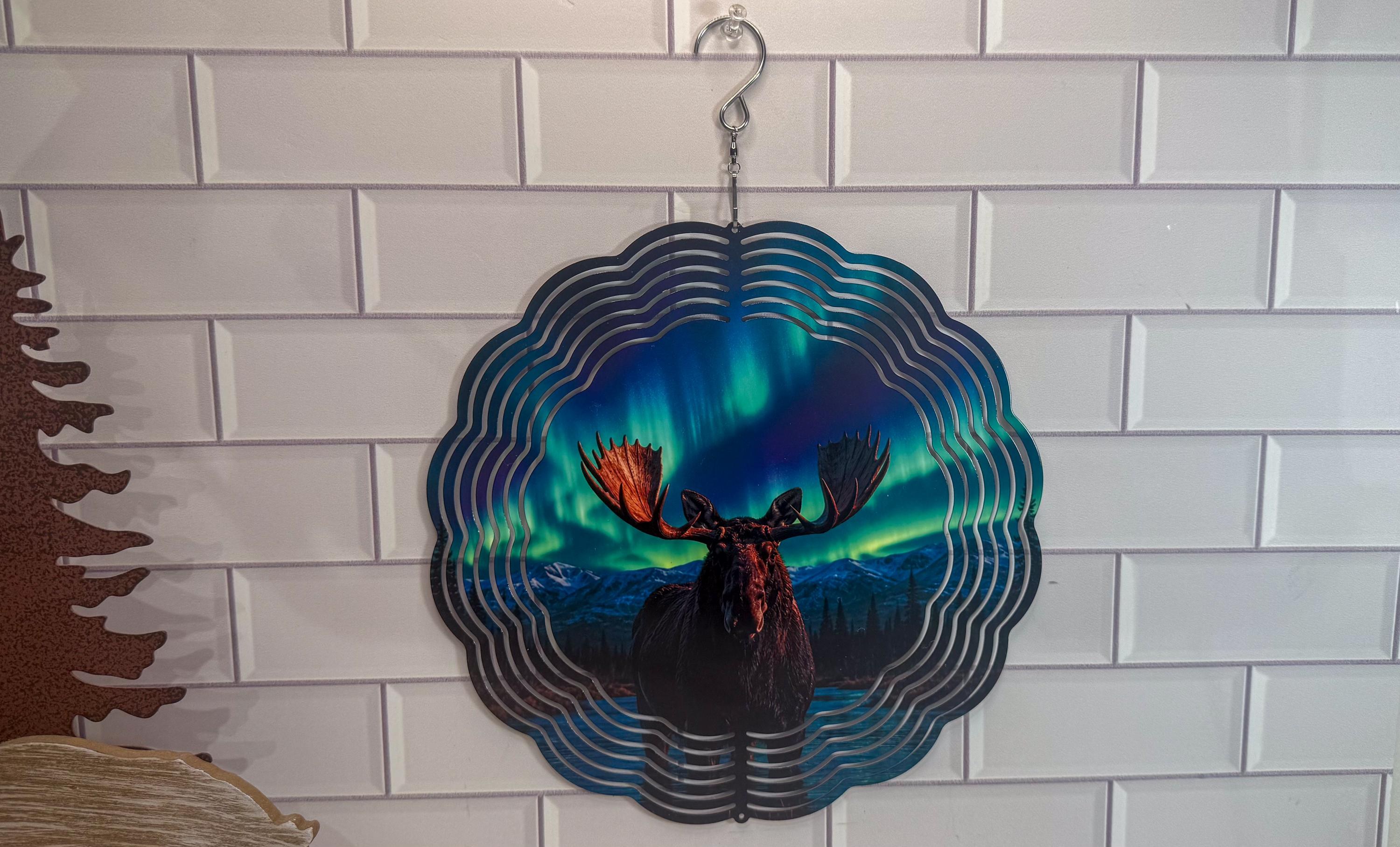 Northern lights moose wind spinner with layered circular movement