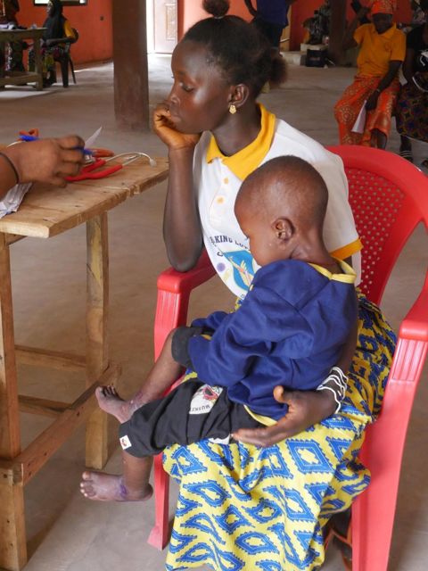 A mother holding her child