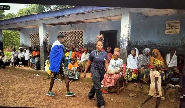 Community members waiting outside the clinic