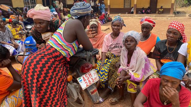 Women gathered during a community visit