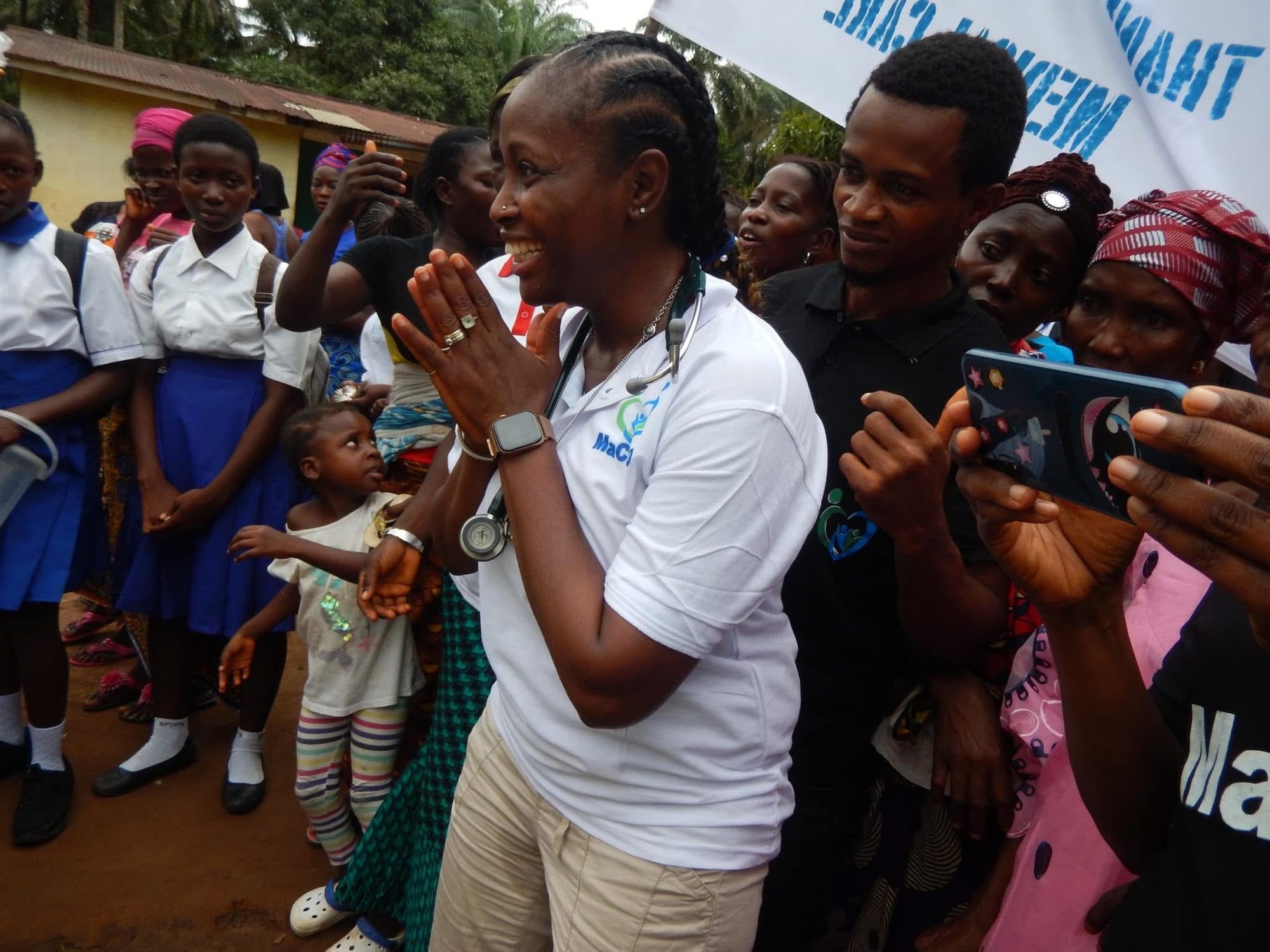Dr. Kadija Conteh-Barrat greeting community members