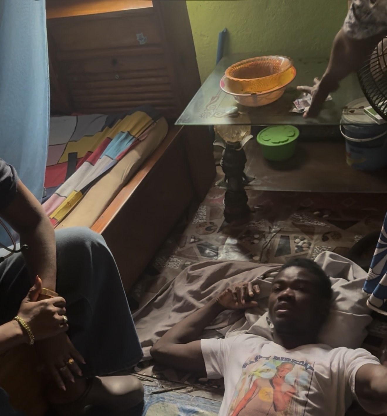 Young man being assessed by the MaCHO team in Makeni