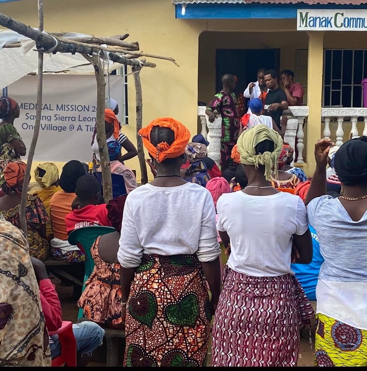 Patients outside the MaCHO clinic in Yurika Village
