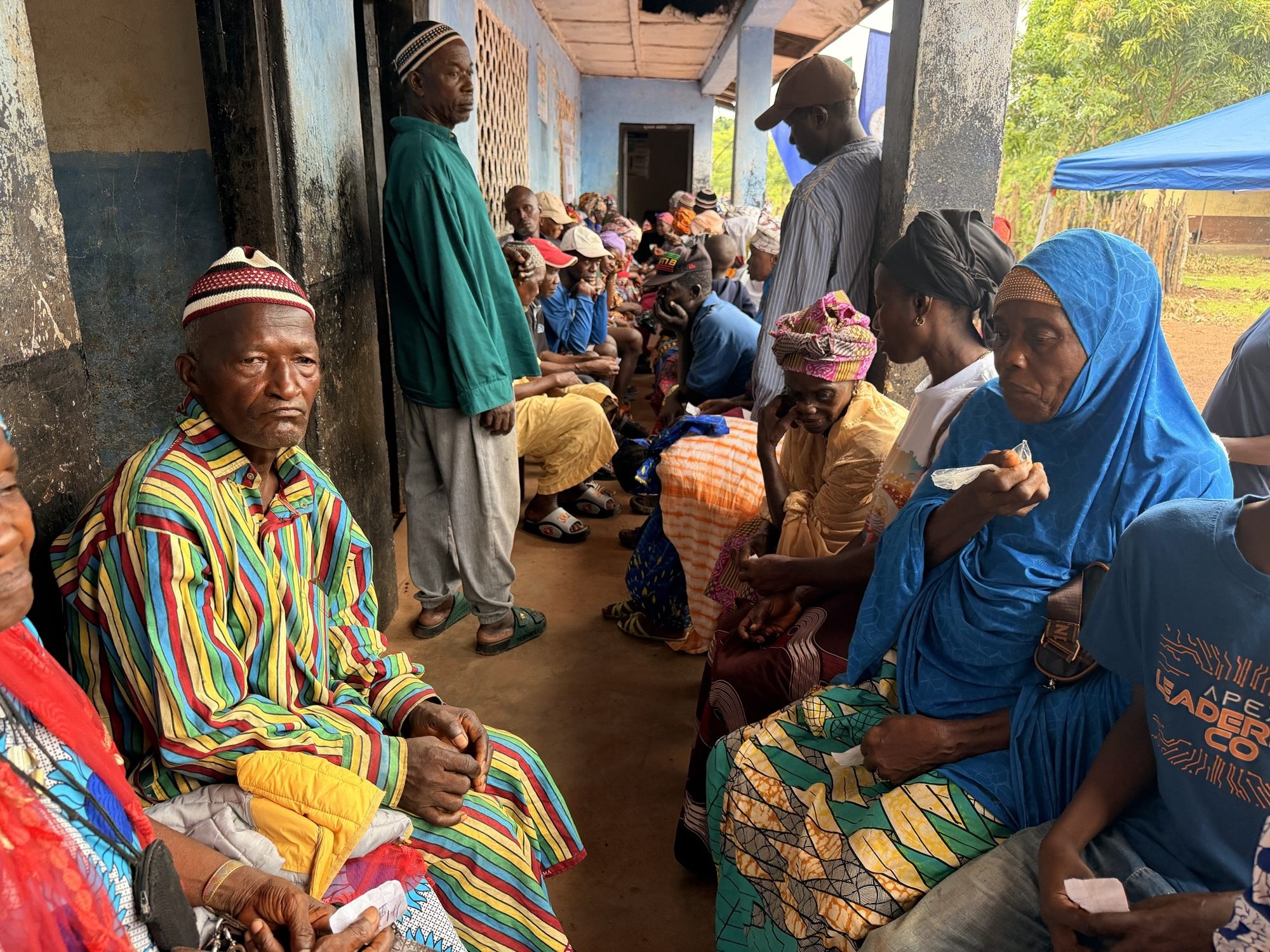 Elders and families waiting at a MaCHO outreach clinic