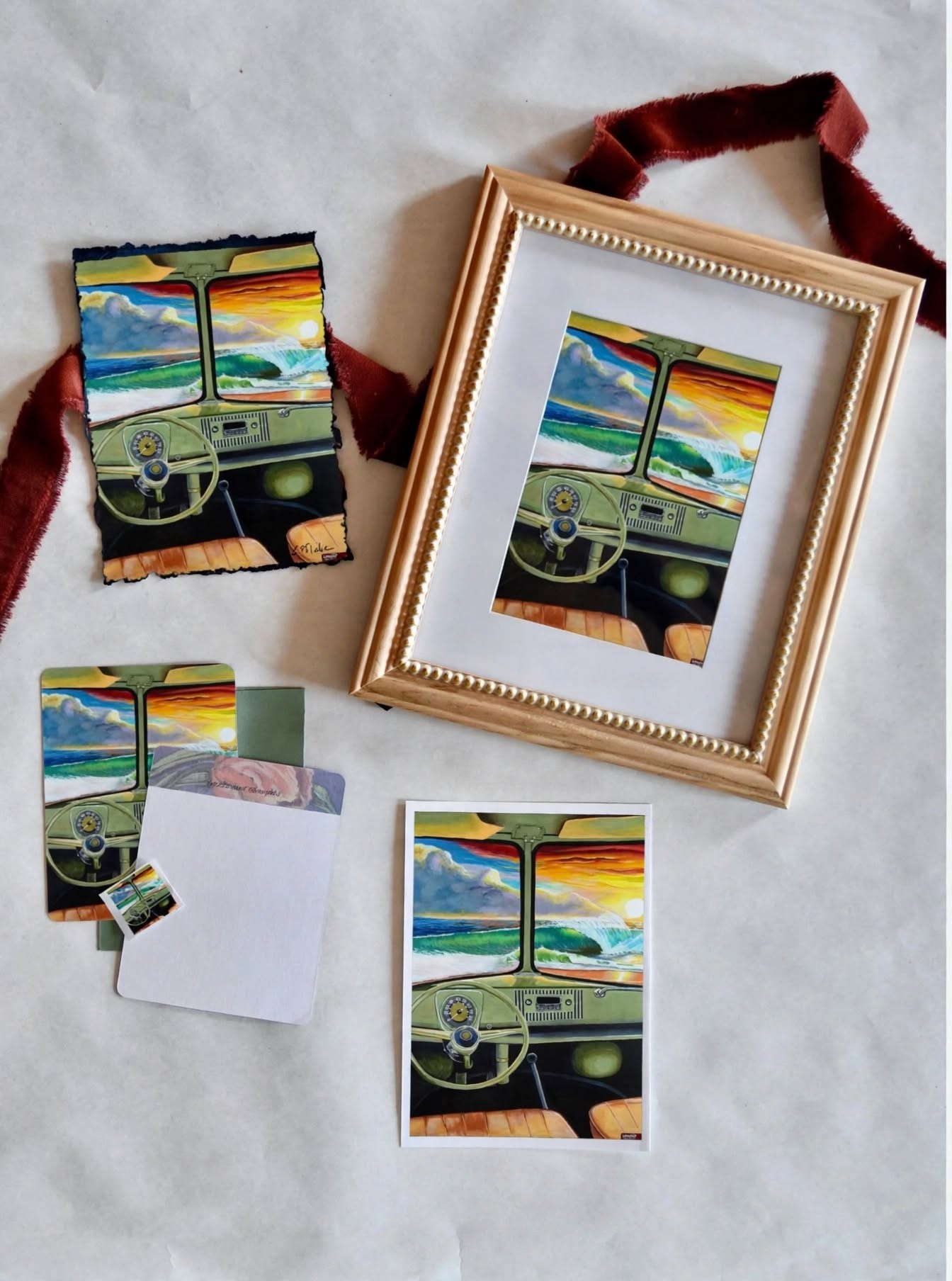 Lasonio Art Print Club package with a signed print, framed artwork, handwritten note, sticker, and mailing envelope