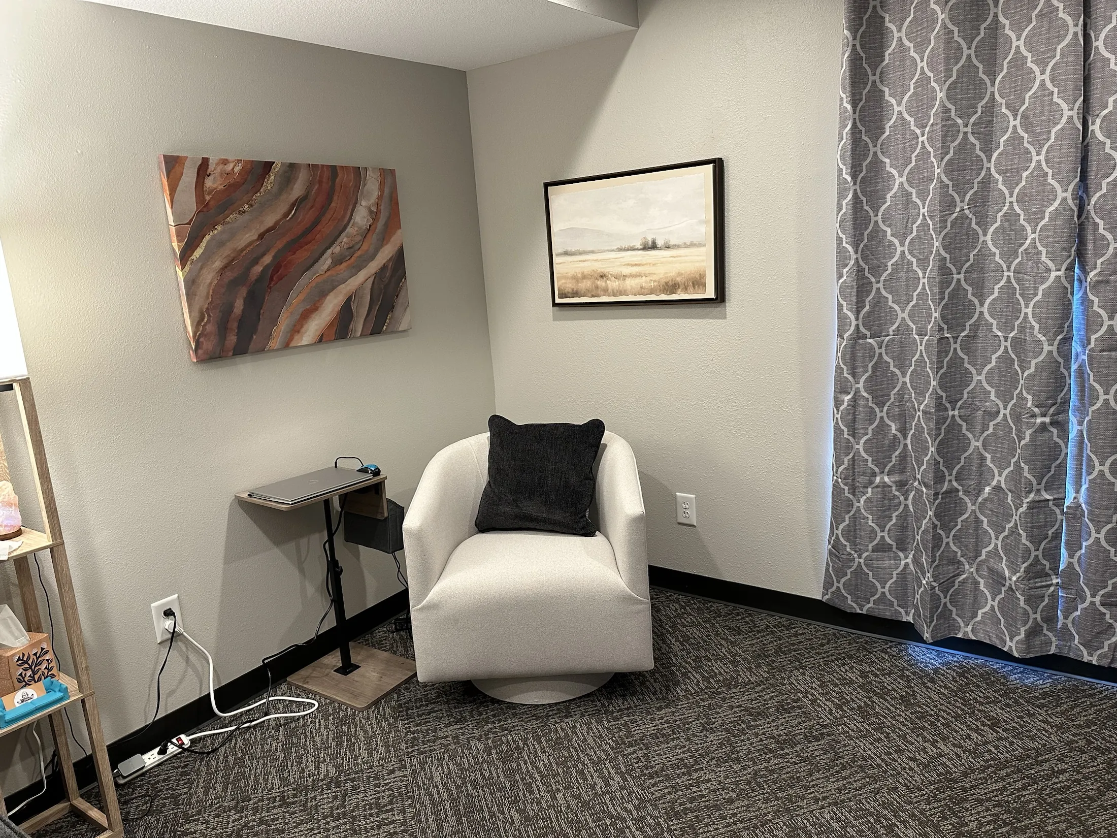 A therapy office seating area at Wellness Works.