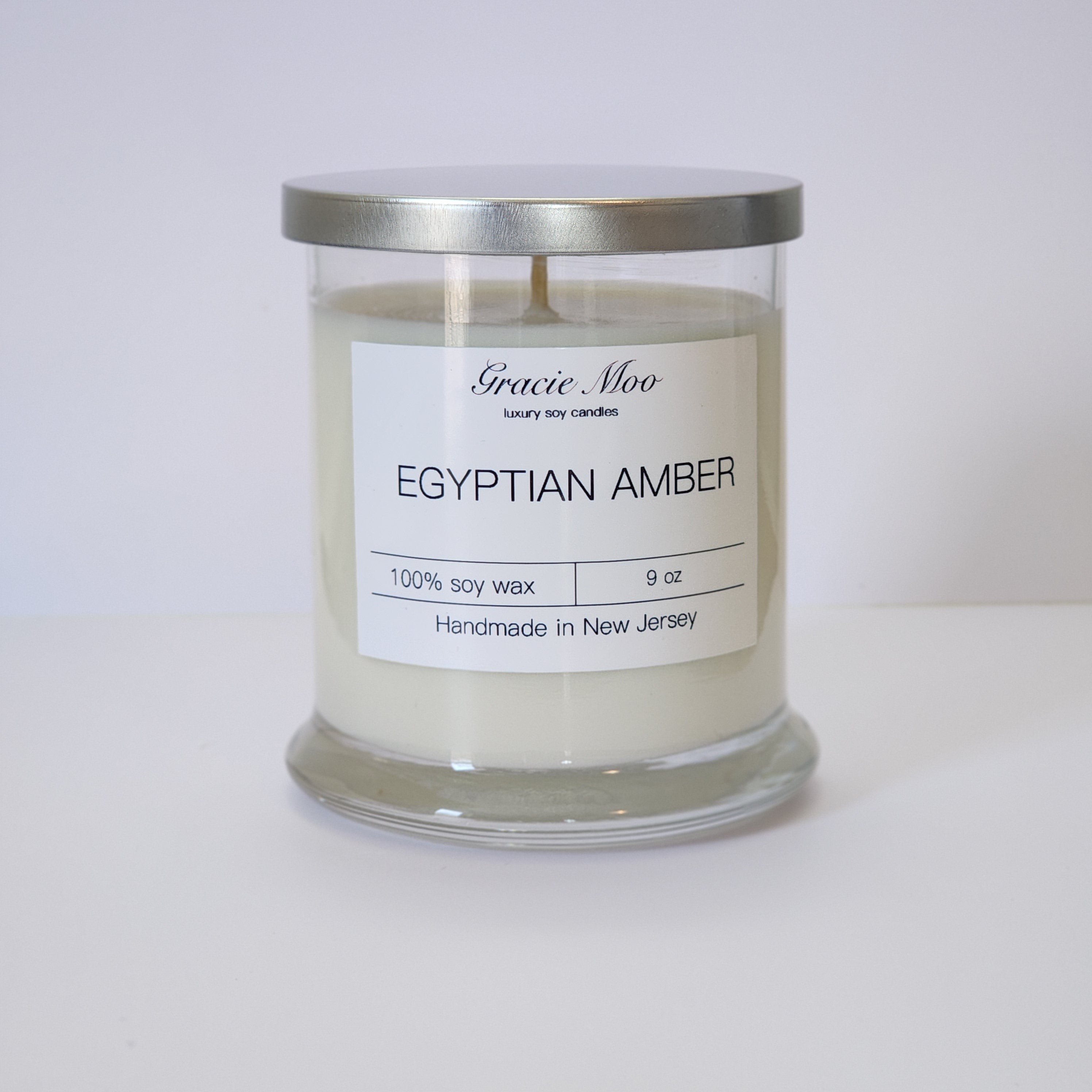 Egyptian Amber candle in Gracie Moo's clear glass jar