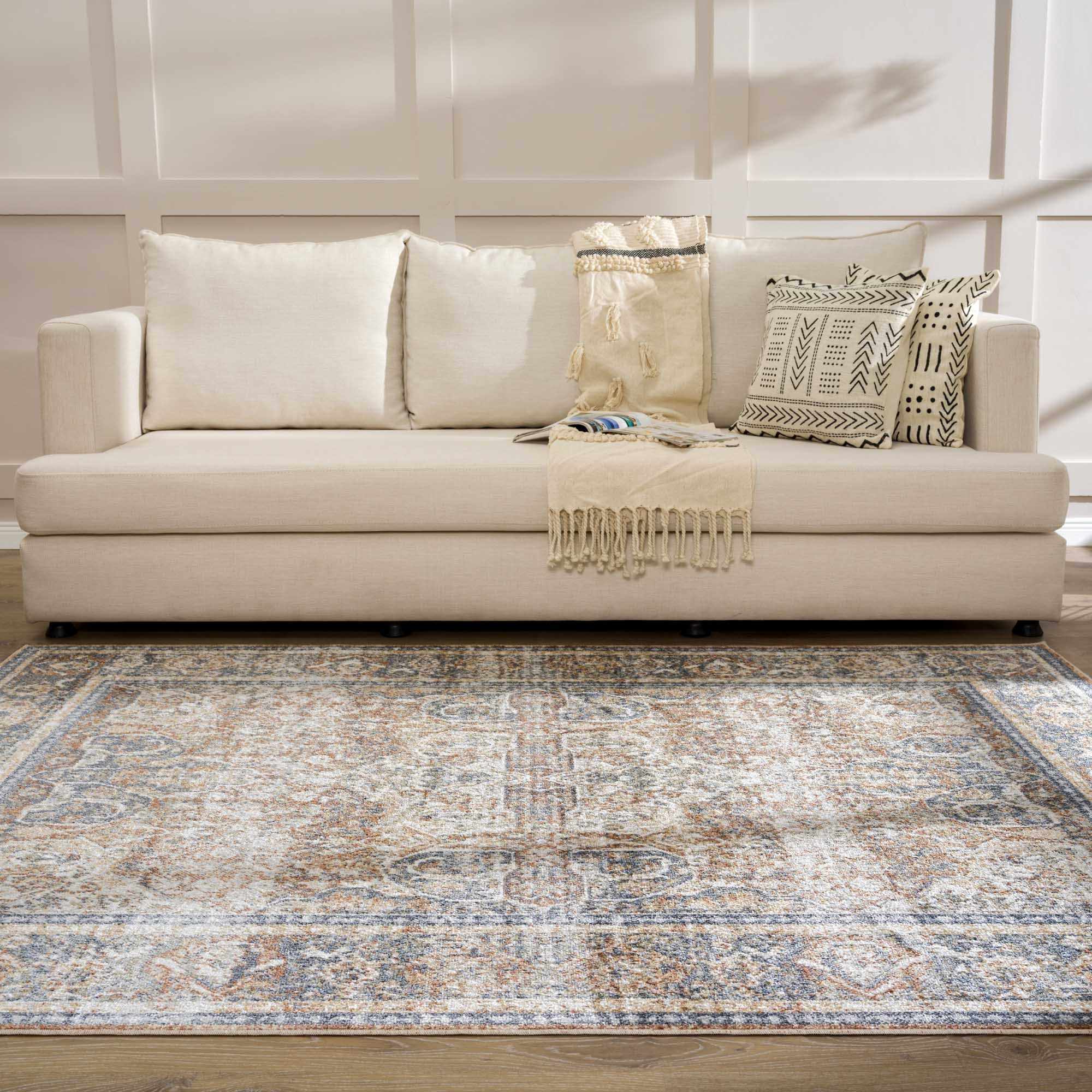 Patterned area rug bringing warmth to a relaxed living room