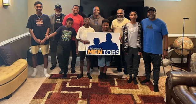 AFGM mentors and young people gathered at a movie event