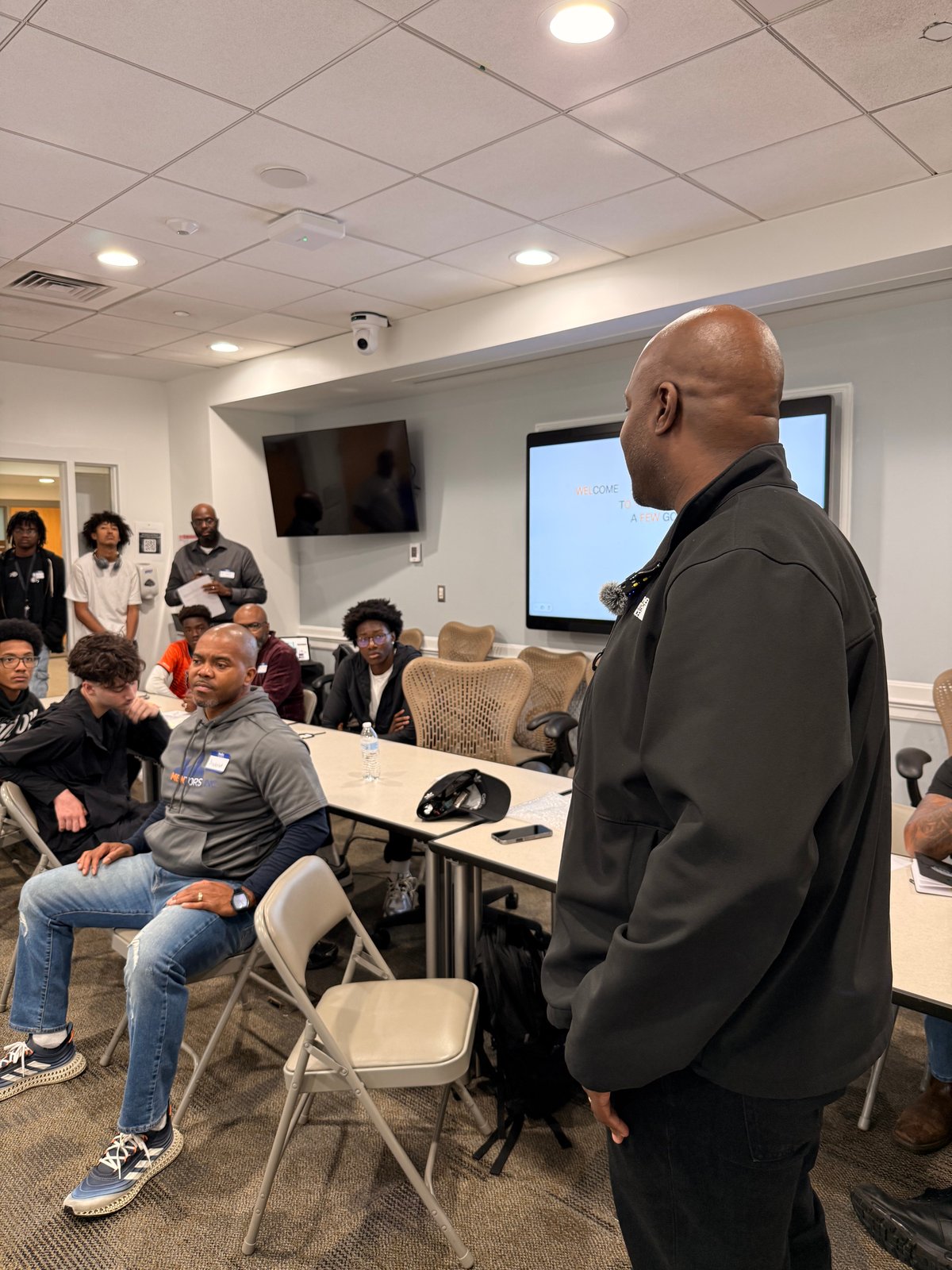A speaker addressing participants at the October S.H.I.E.L.D.S. Meetup