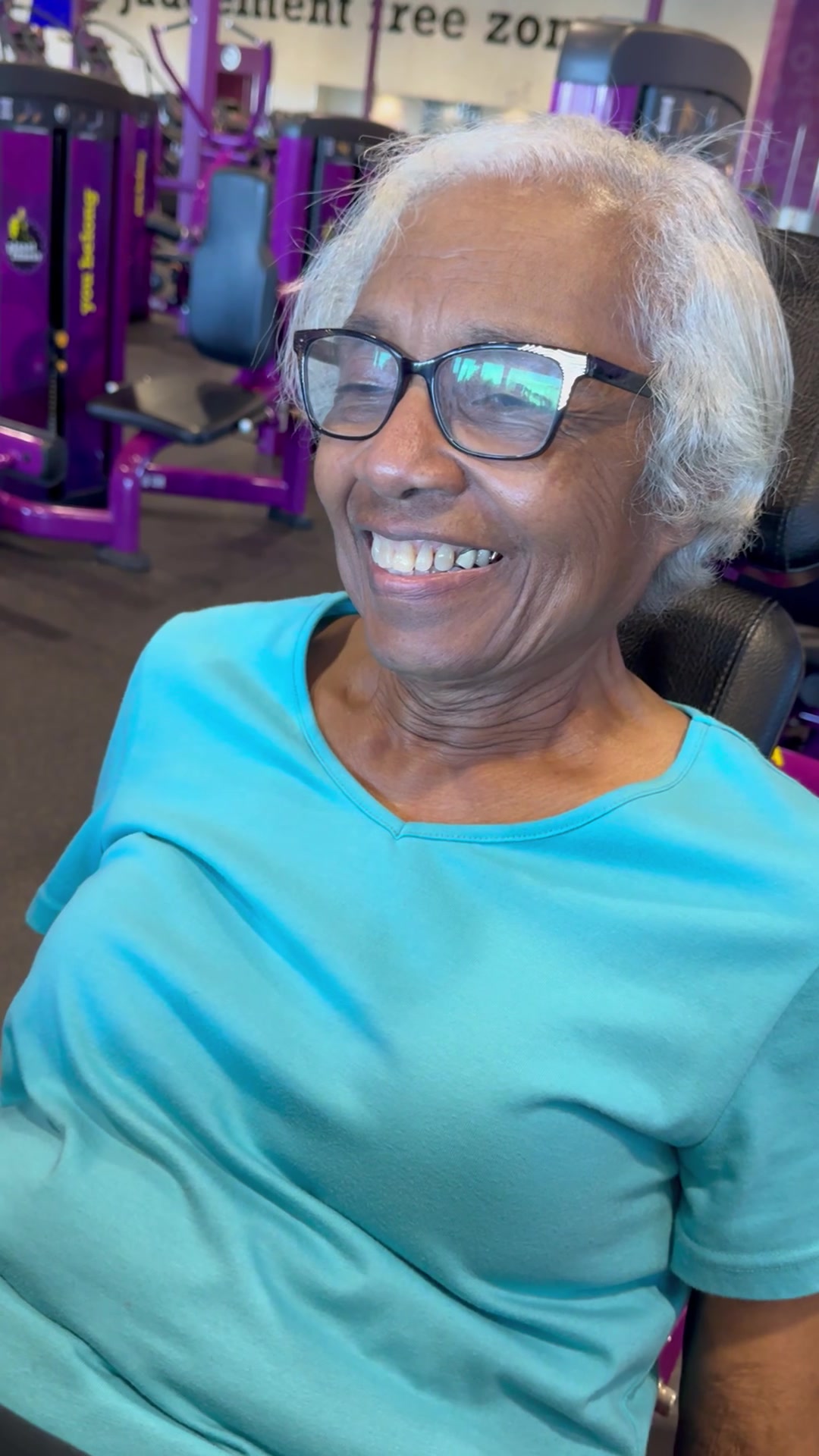 Duet training client smiling during a strength session