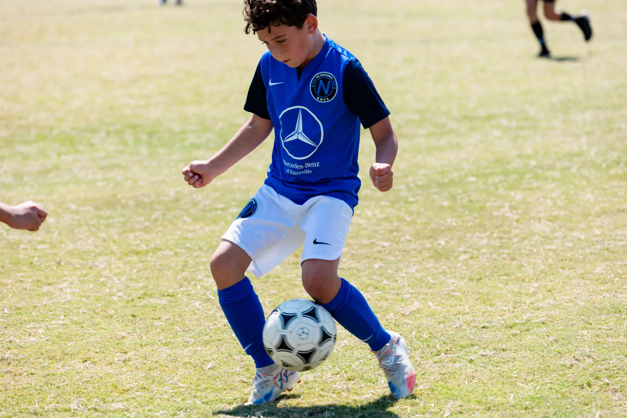 FC National players training on the soccer field