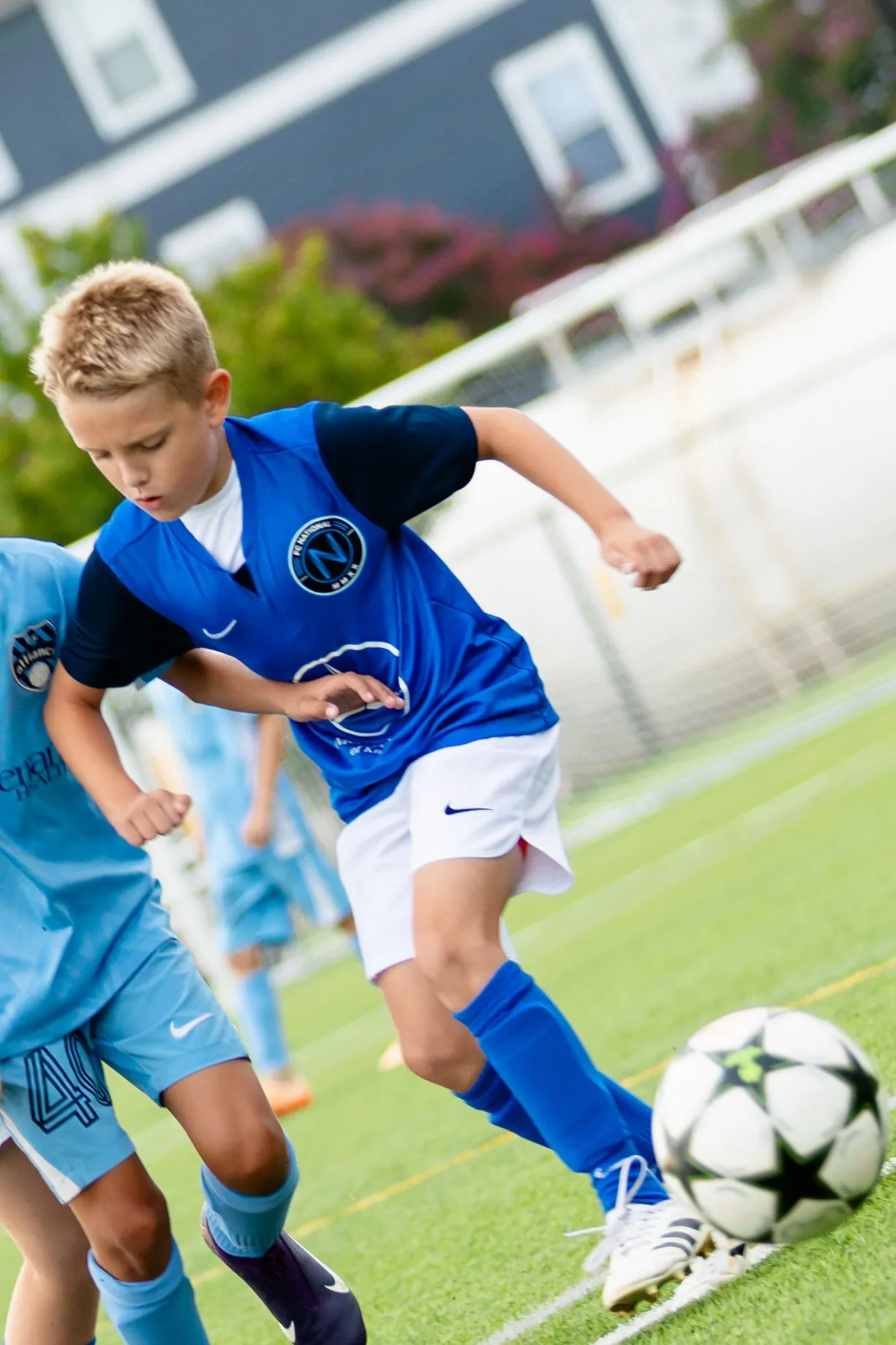 FC National players competing for the ball during a match