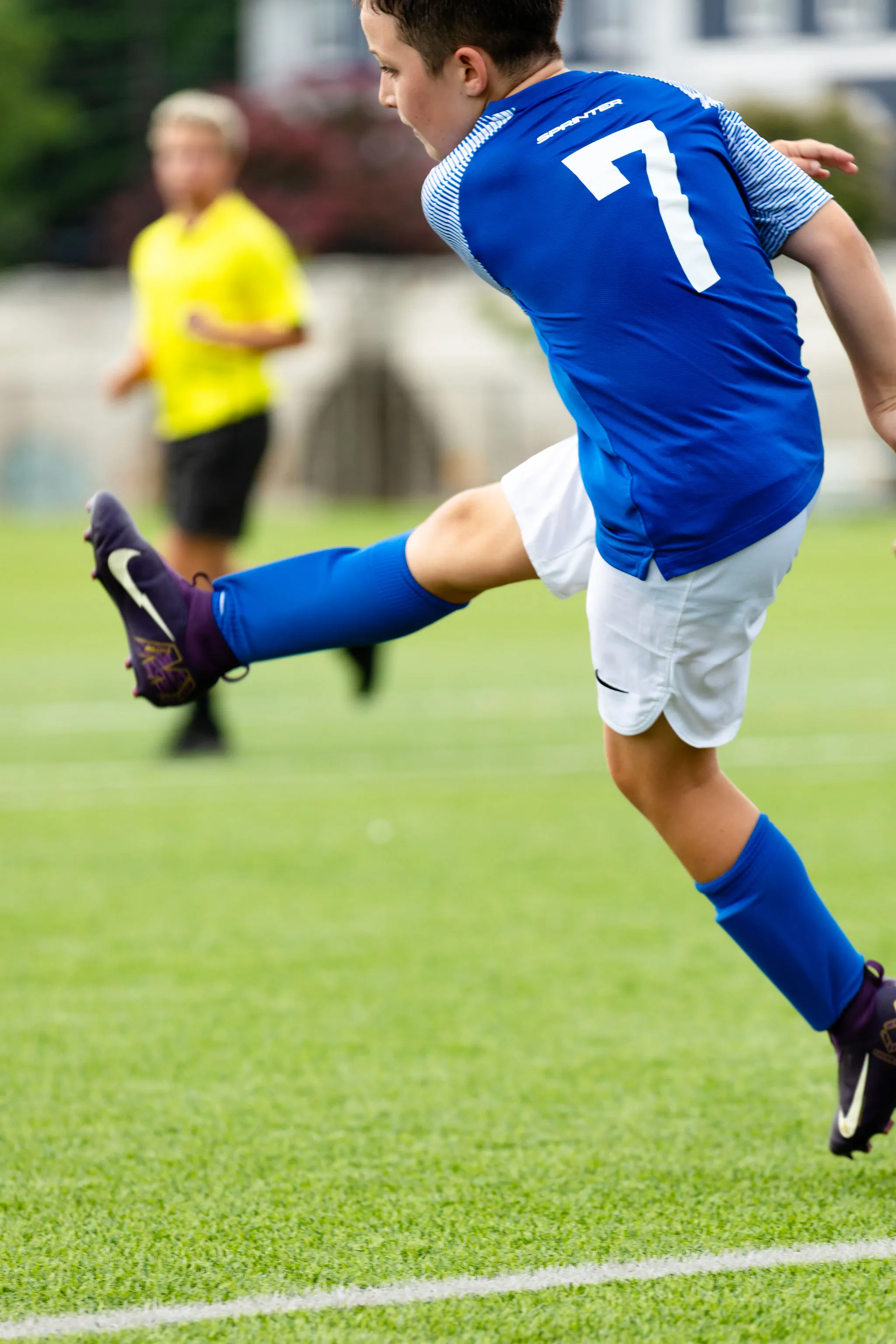 Young soccer players training together on a field