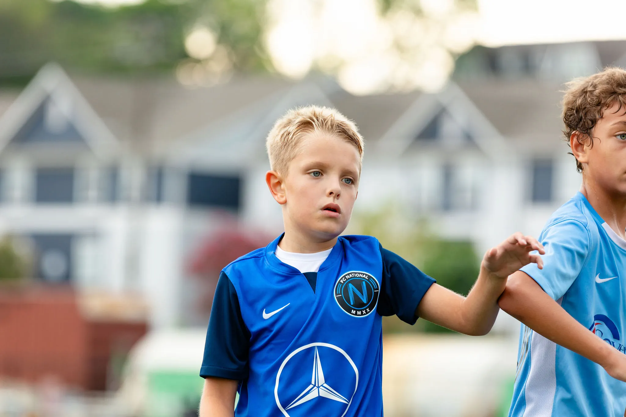 FC National youth soccer team gathered together on the field
