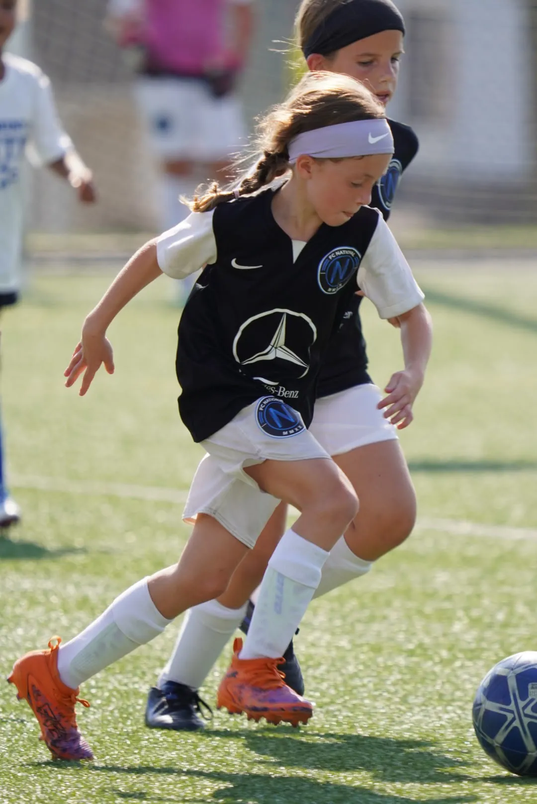 Player training with a soccer ball