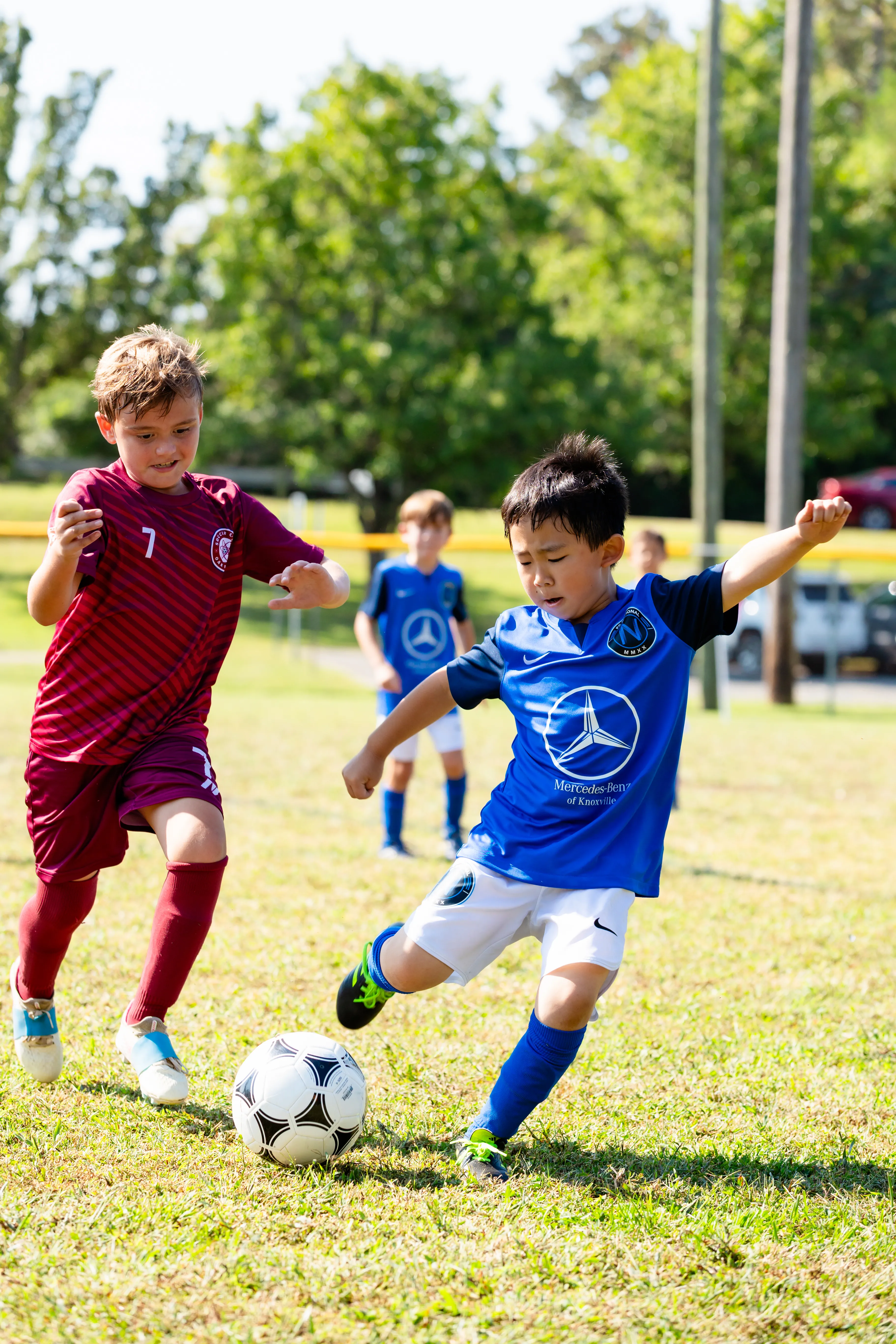 FC National player competing for the ball
