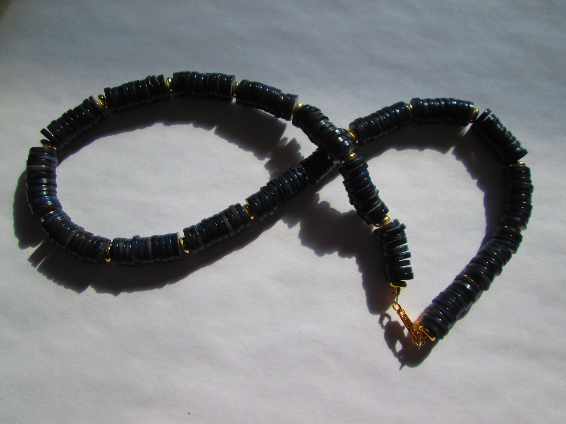 Handmade Black Heishi Shell Necklace with Gold Spacers