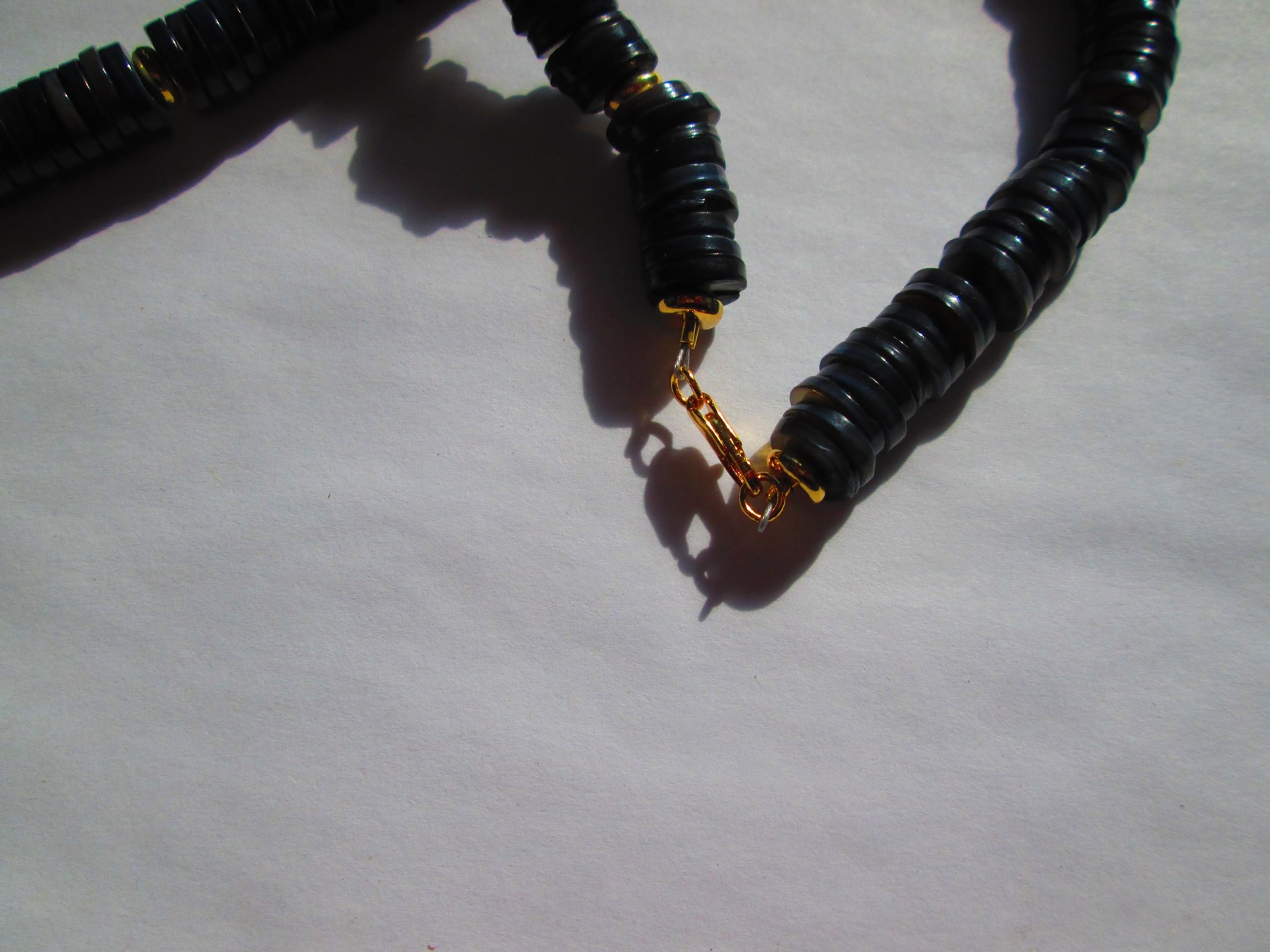 Handmade Black Heishi Shell Necklace with Gold Spacers, detail 2