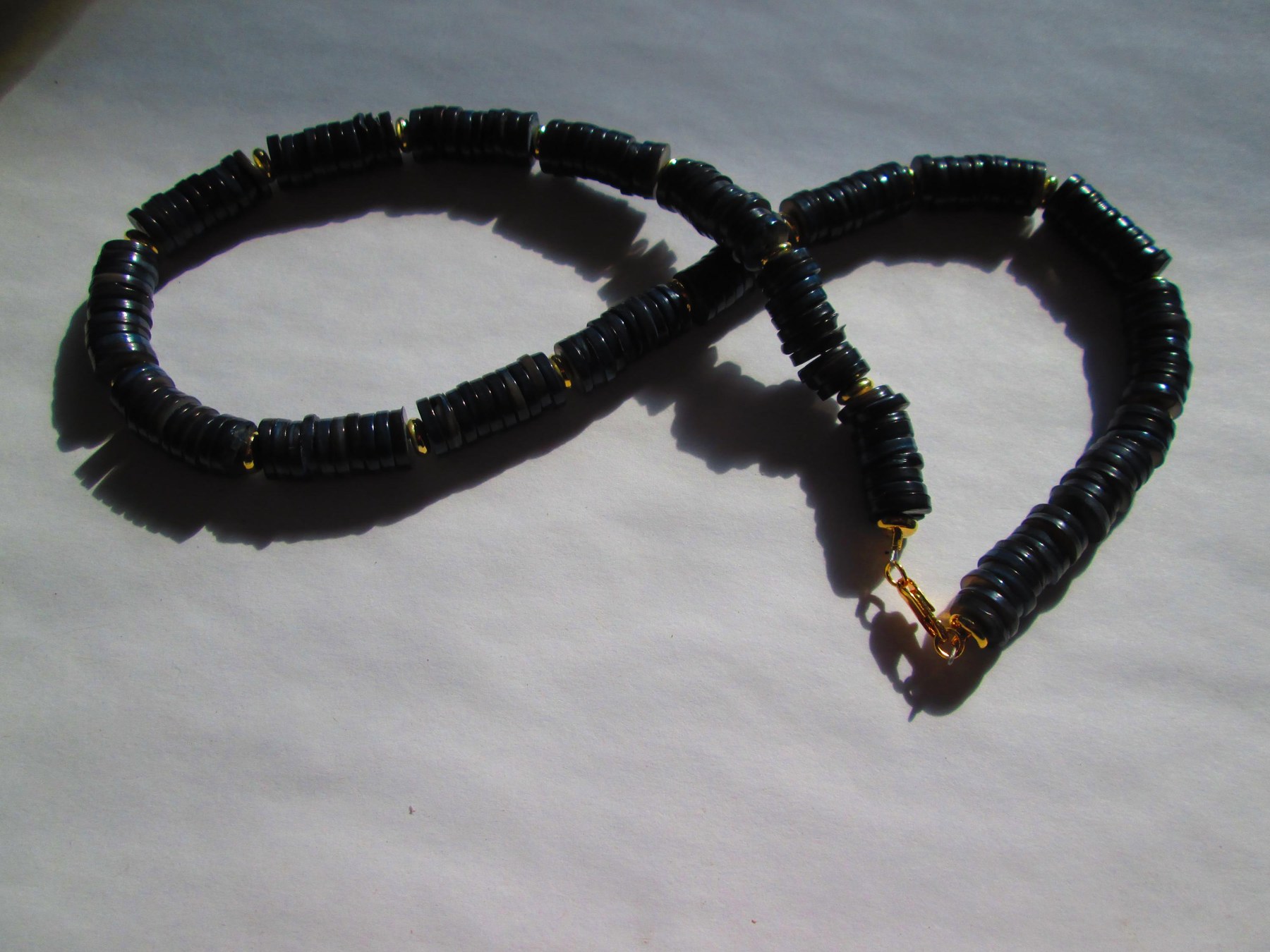 Handmade Black Heishi Shell Necklace with Gold Spacers, detail 3