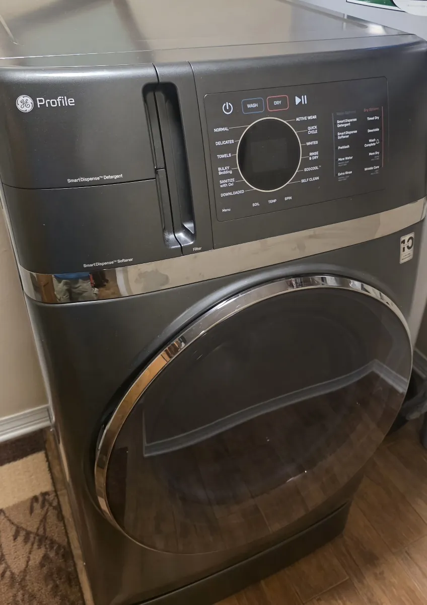 GE Profile all-in-one washer dryer with the control panel visible