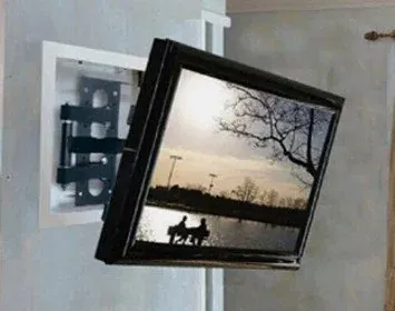 Wall-mounted television in a home