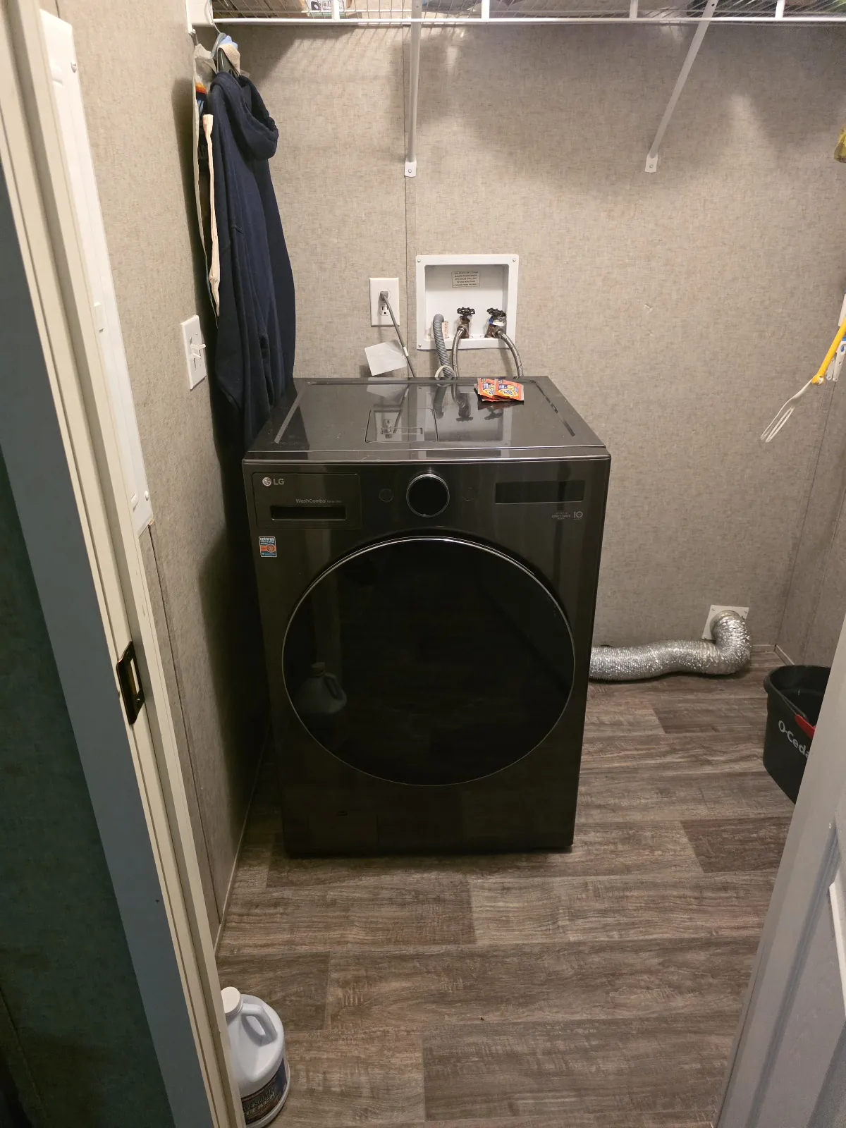 Washer/dryer all-in-one combo in a customer’s laundry room