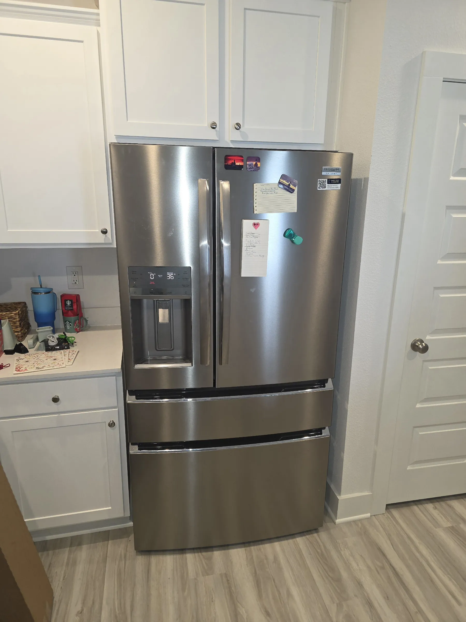 Stainless refrigerator in a customer’s kitchen