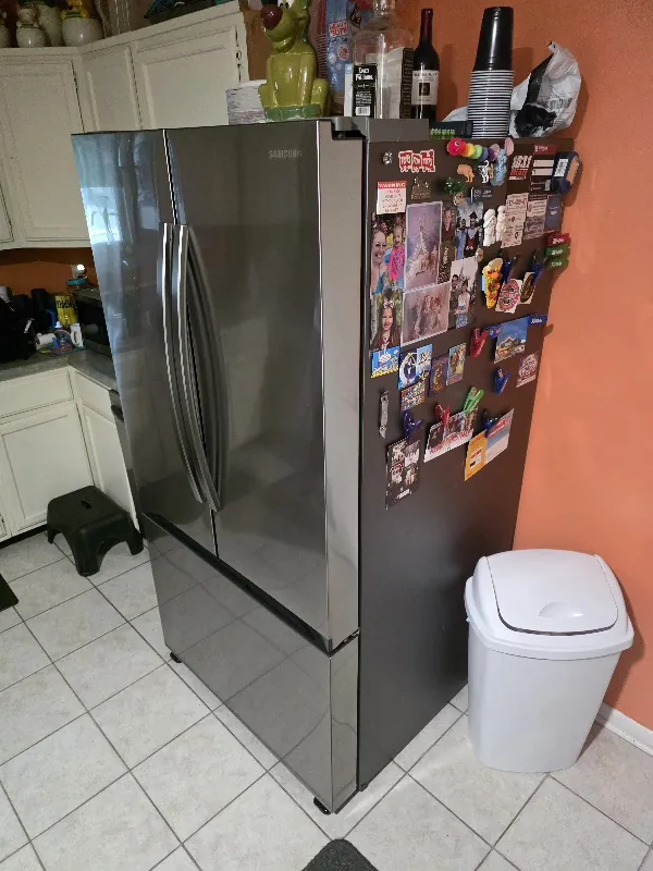 Refrigerator in a bright customer kitchen