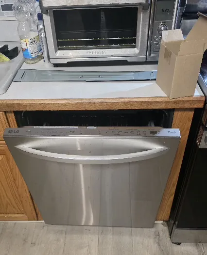 Dishwasher serviced in a customer’s kitchen