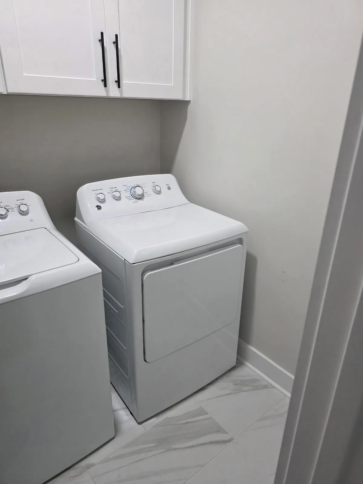 Washer and dryer pair in a customer’s laundry room