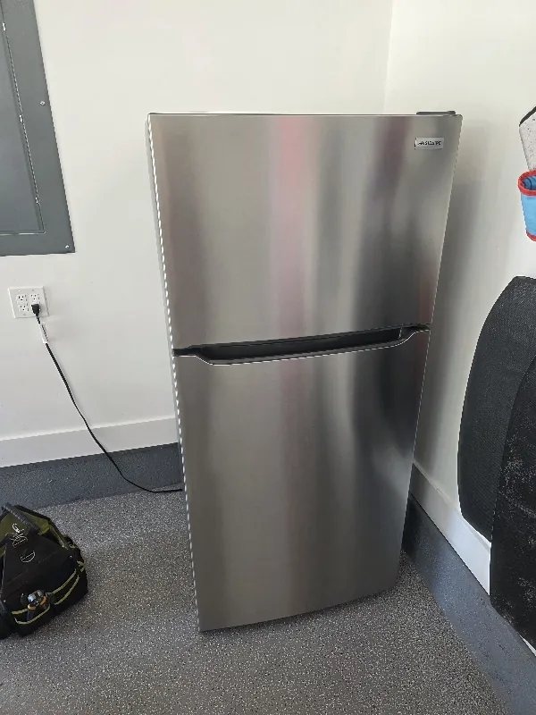 Stainless refrigerator in a customer’s home