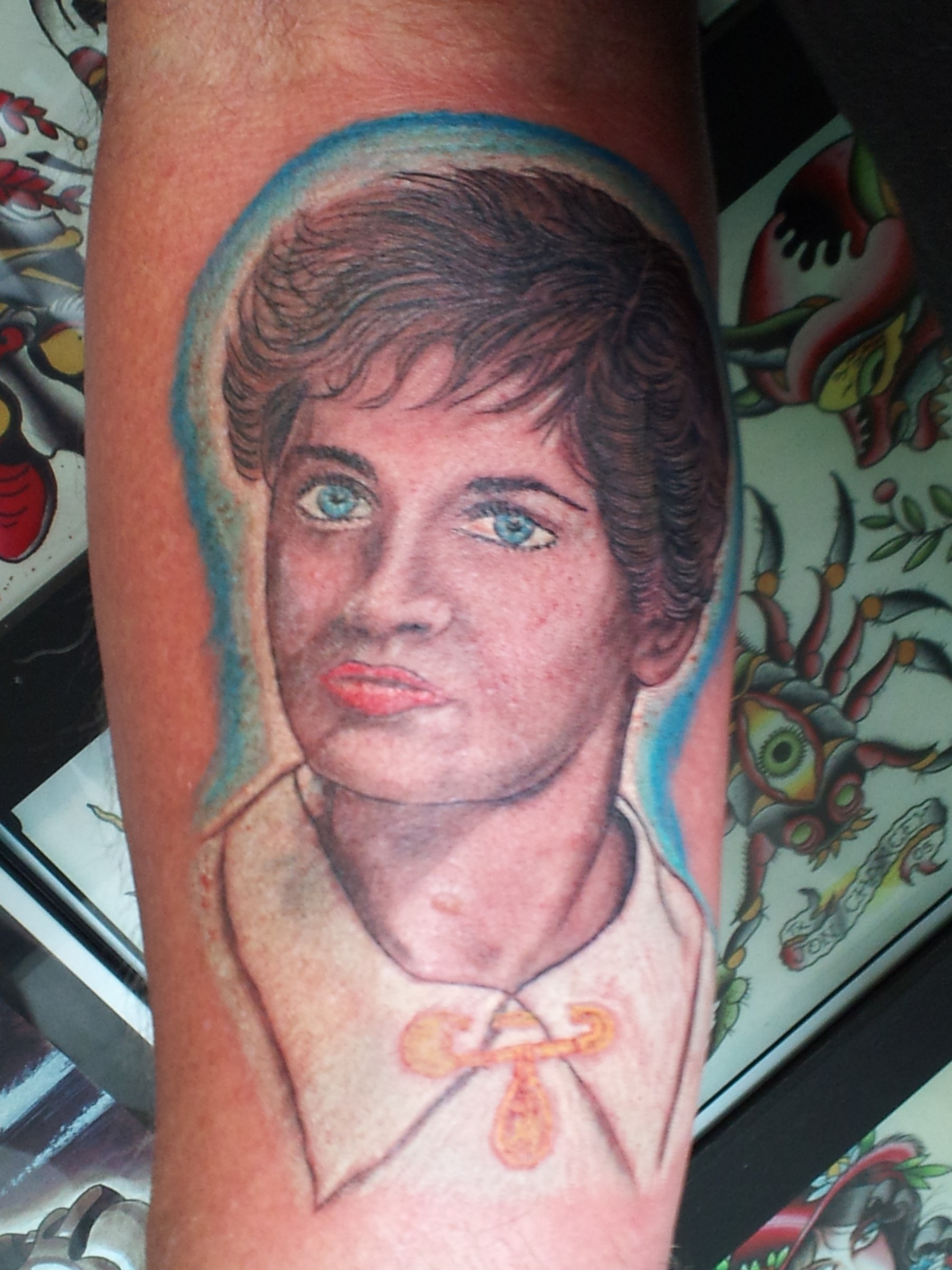 Realistic portrait tattoo by Joe Kennedy