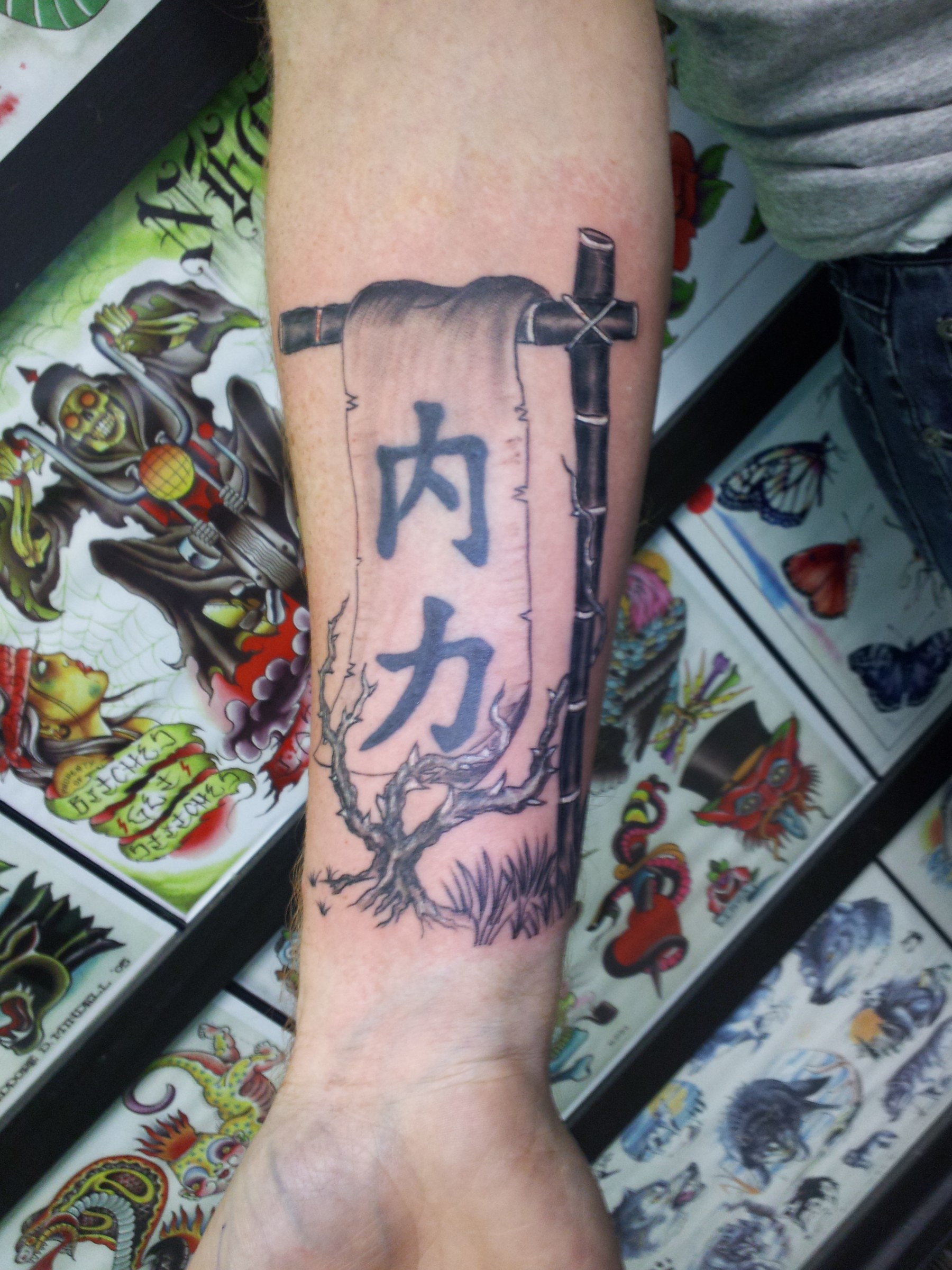 Japanese-inspired scroll tattoo by Joe Kennedy