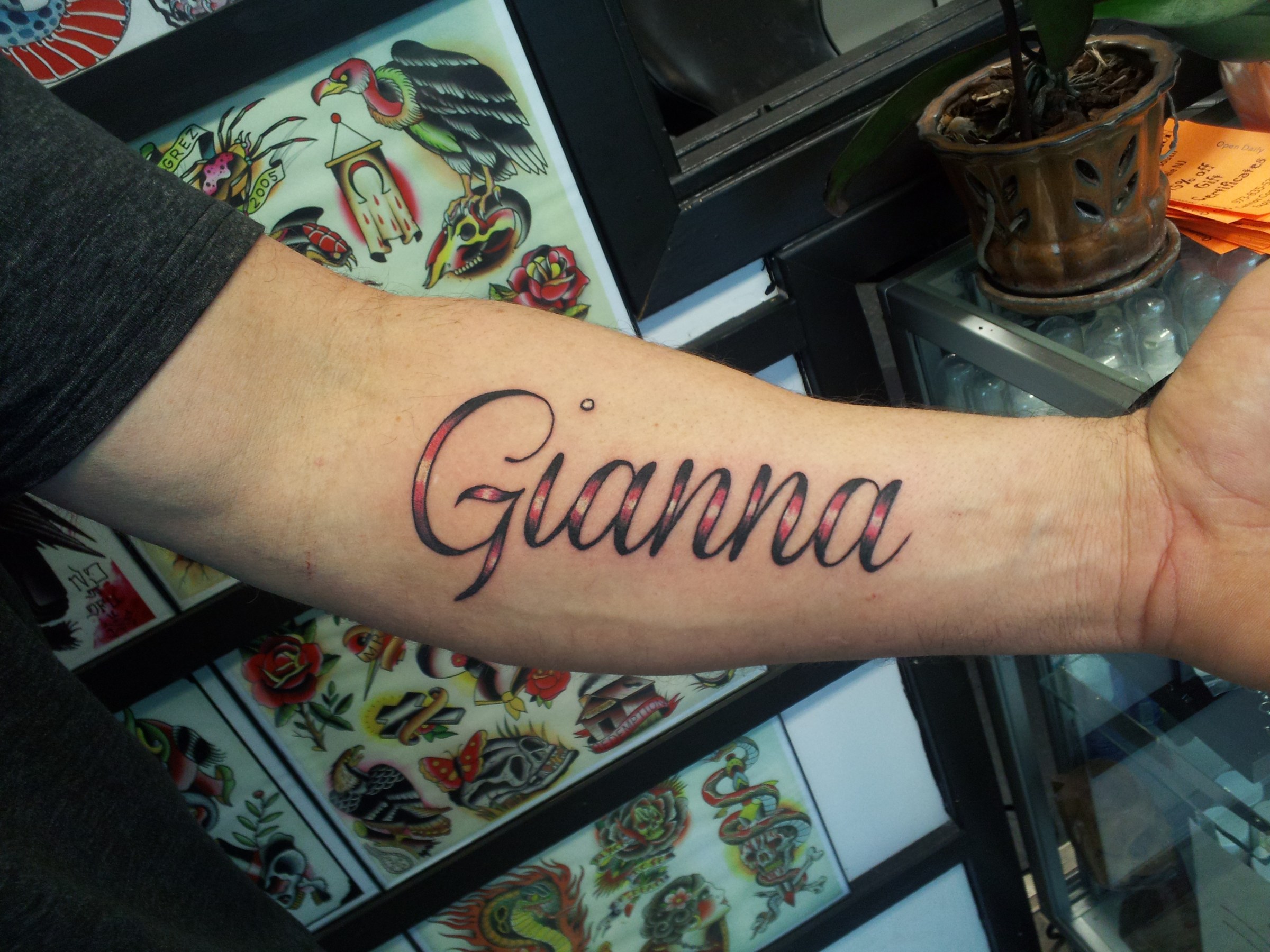Script tattoo by Joe Kennedy
