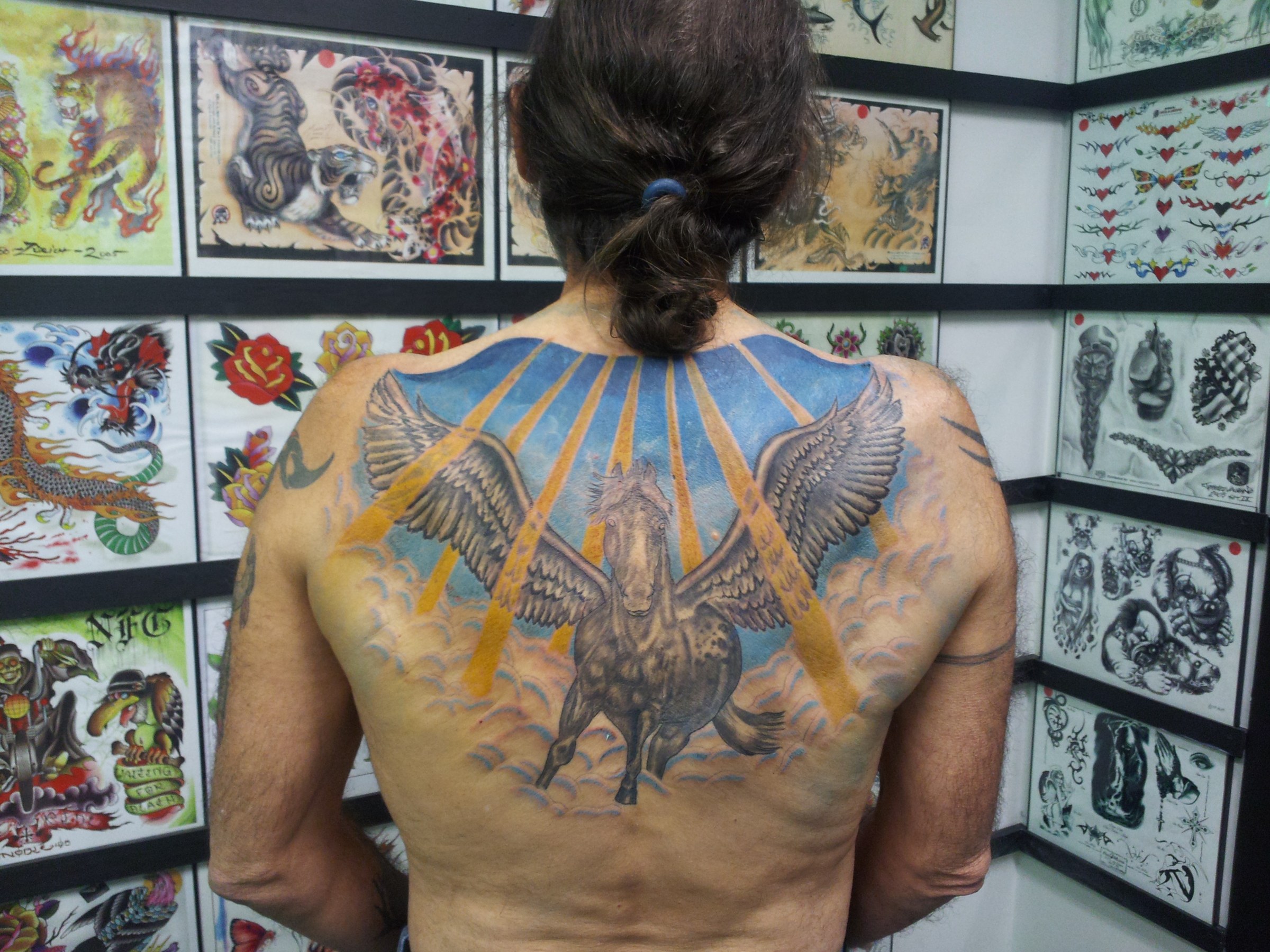 Large winged back tattoo by Joe Kennedy