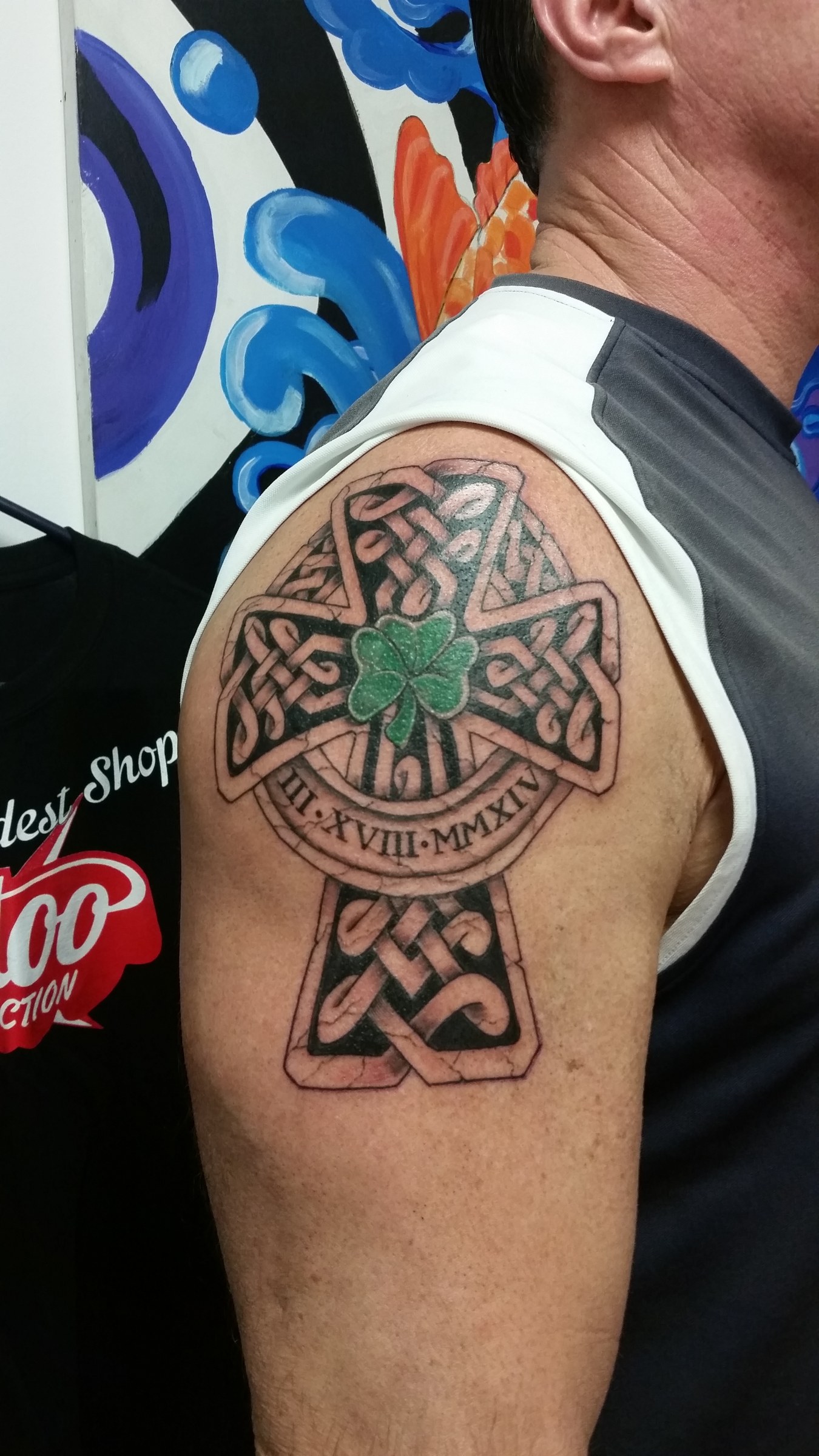Celtic cross tattoo by Joe Kennedy
