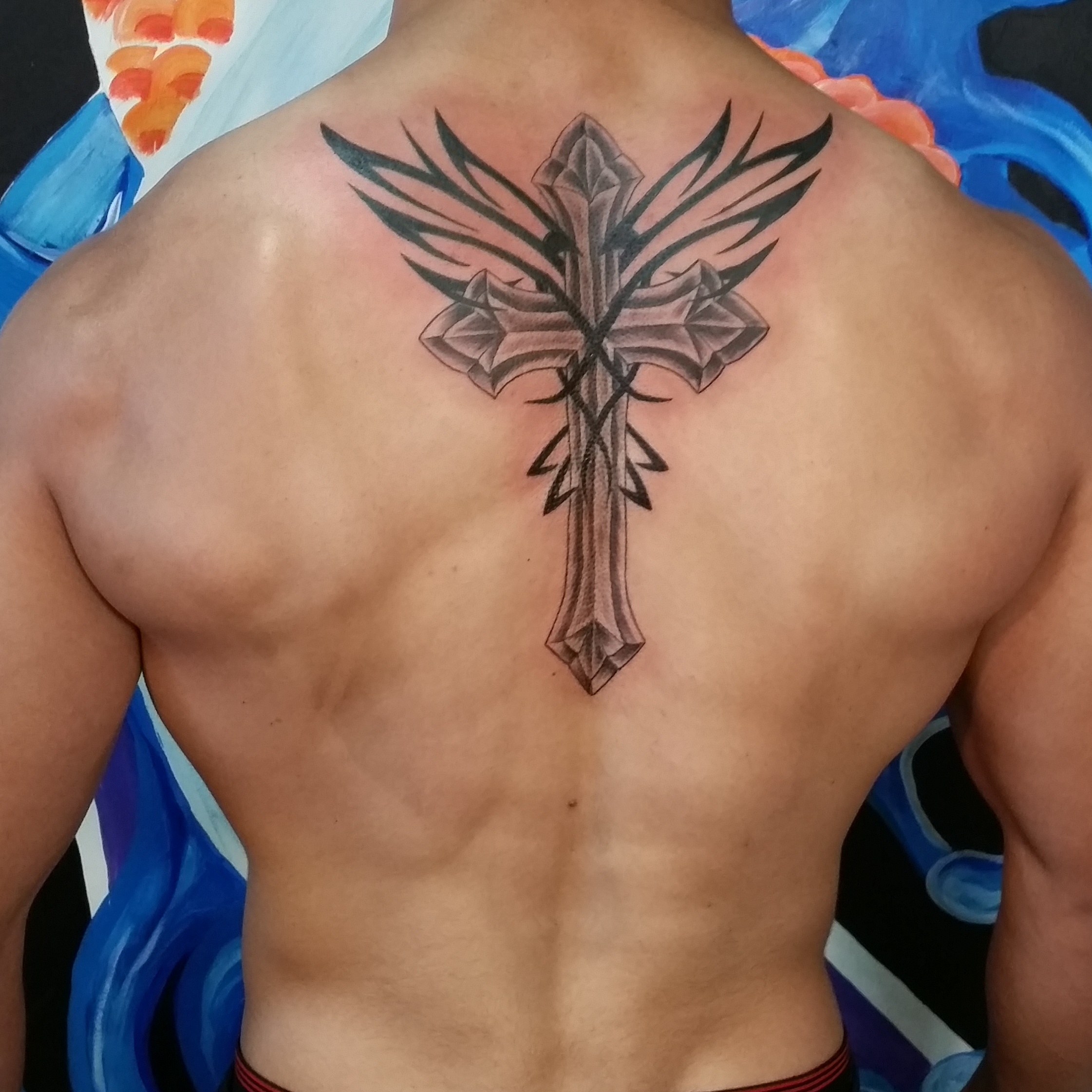 Ornamental cross tattoo by Joe Kennedy