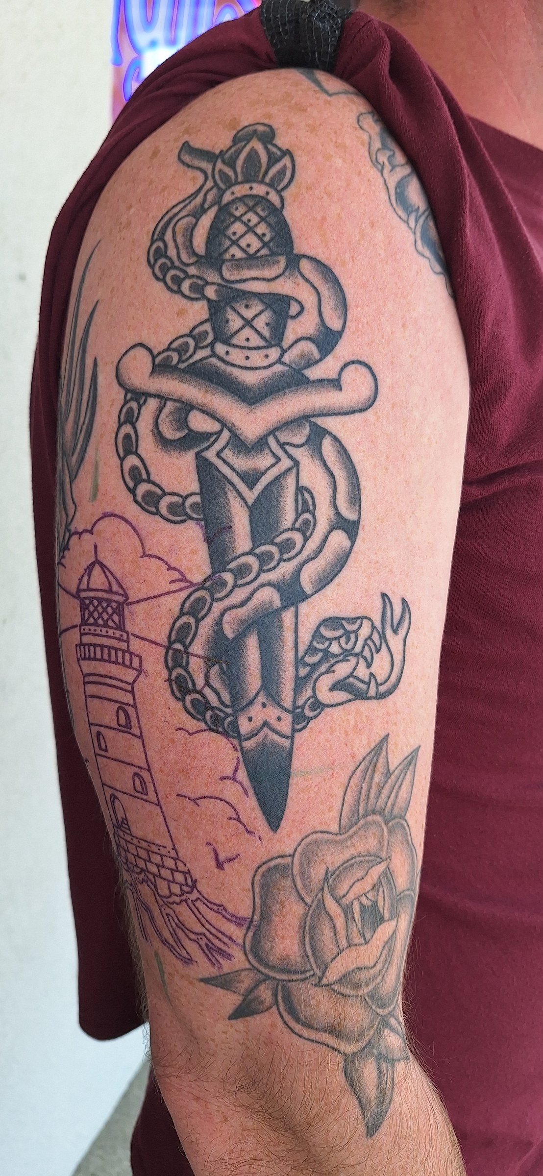 Chain, dice and tattoo machine sleeve tattoo by Rob Scotti