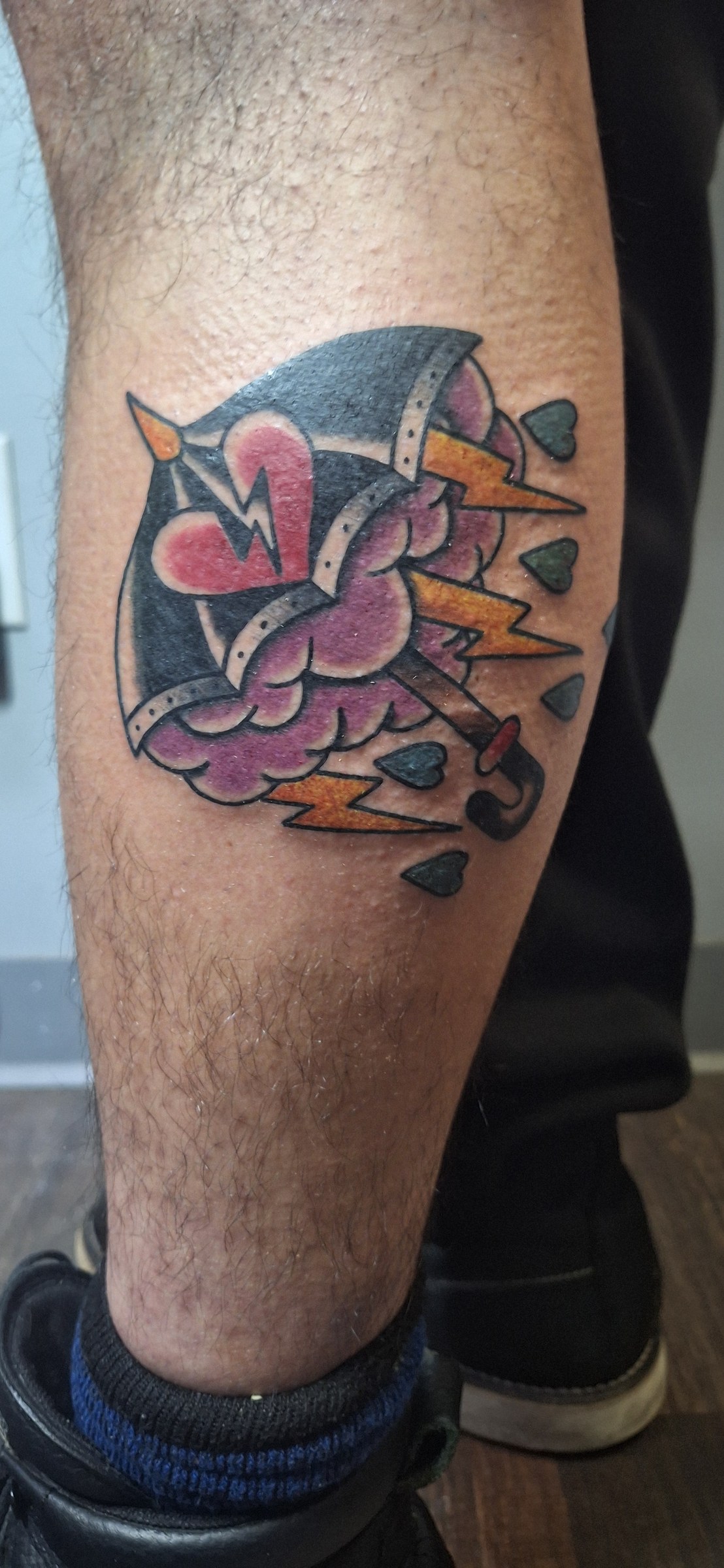Colorful sacred heart tattoo by Rob Scotti