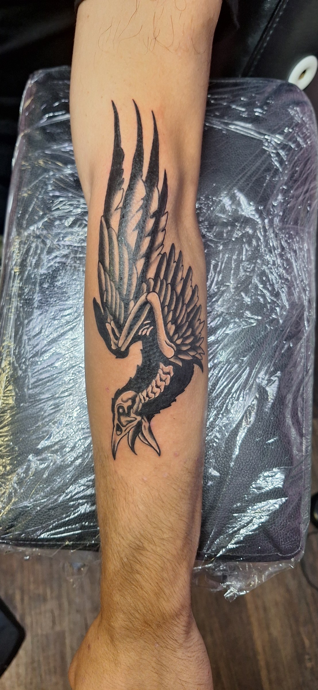 Blackwork swallow tattoo by Rob Scotti